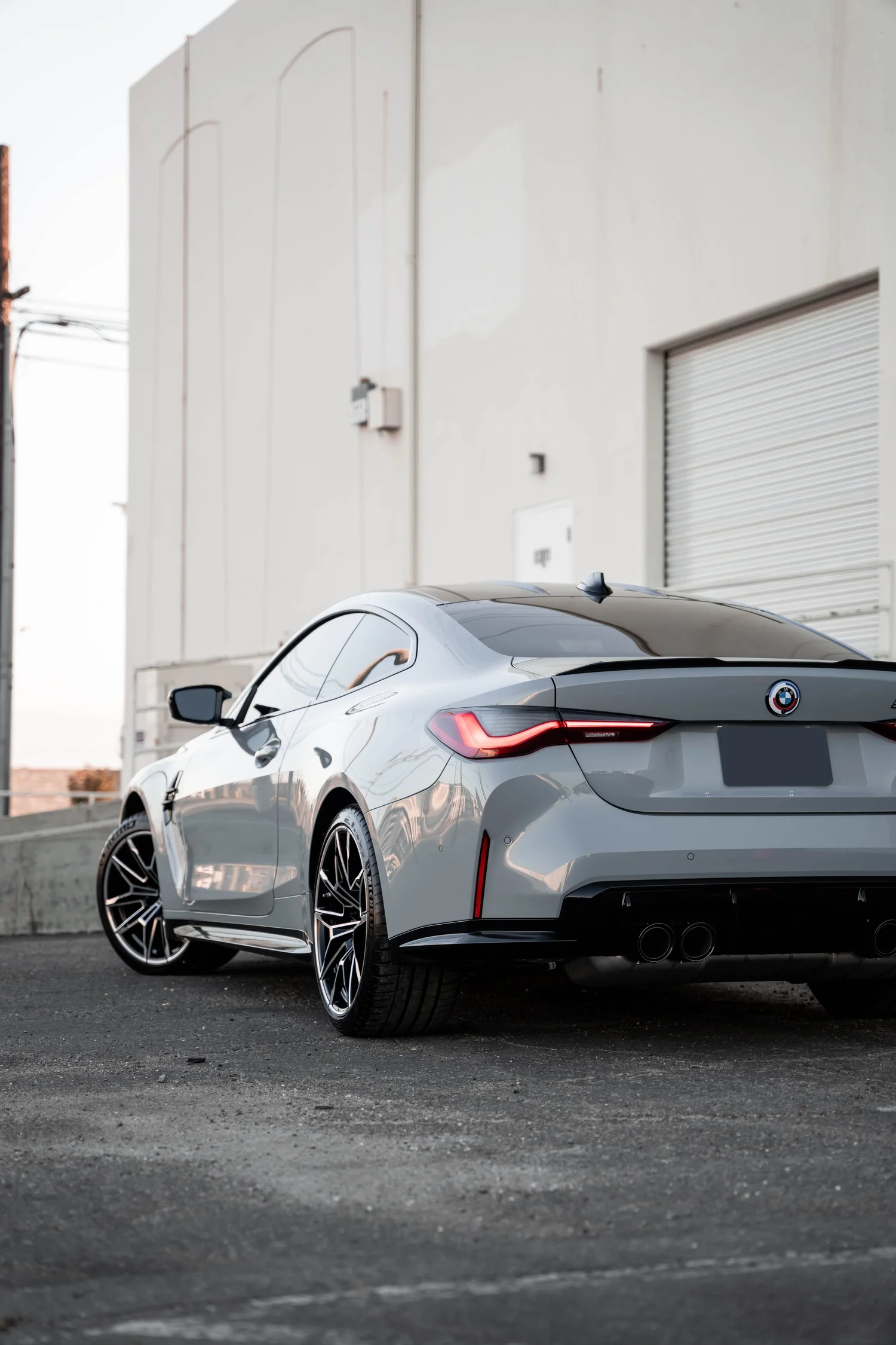 BMW M4 after Paint Protection Film (PPF), Window Tint and Ceramic Coating, rear-left three-quarter view
