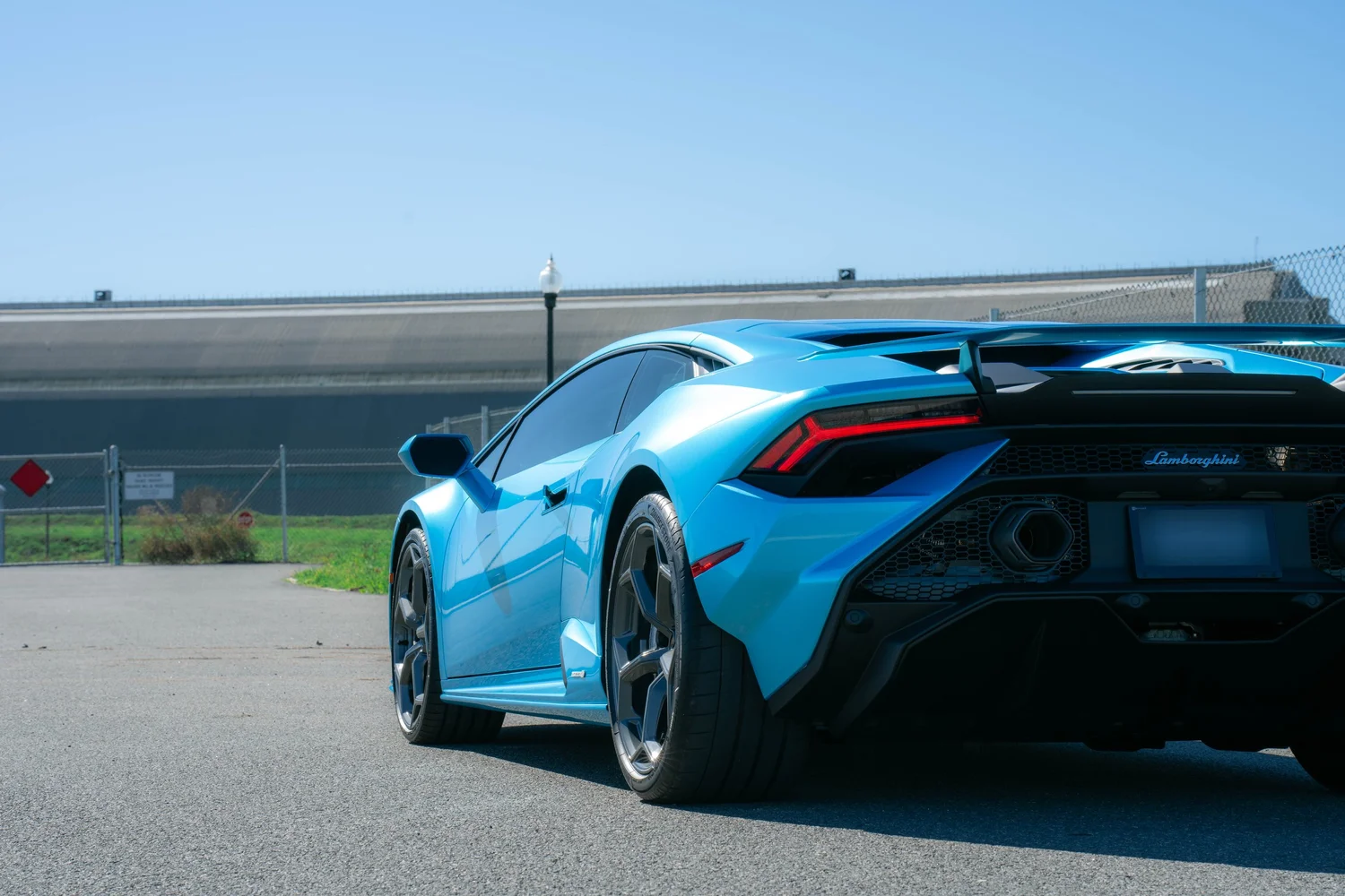 Lamborghini Huracán Tecnica after Paint Protection Film (PPF) and Vinyl Wrap, rear-quarter and wheel view