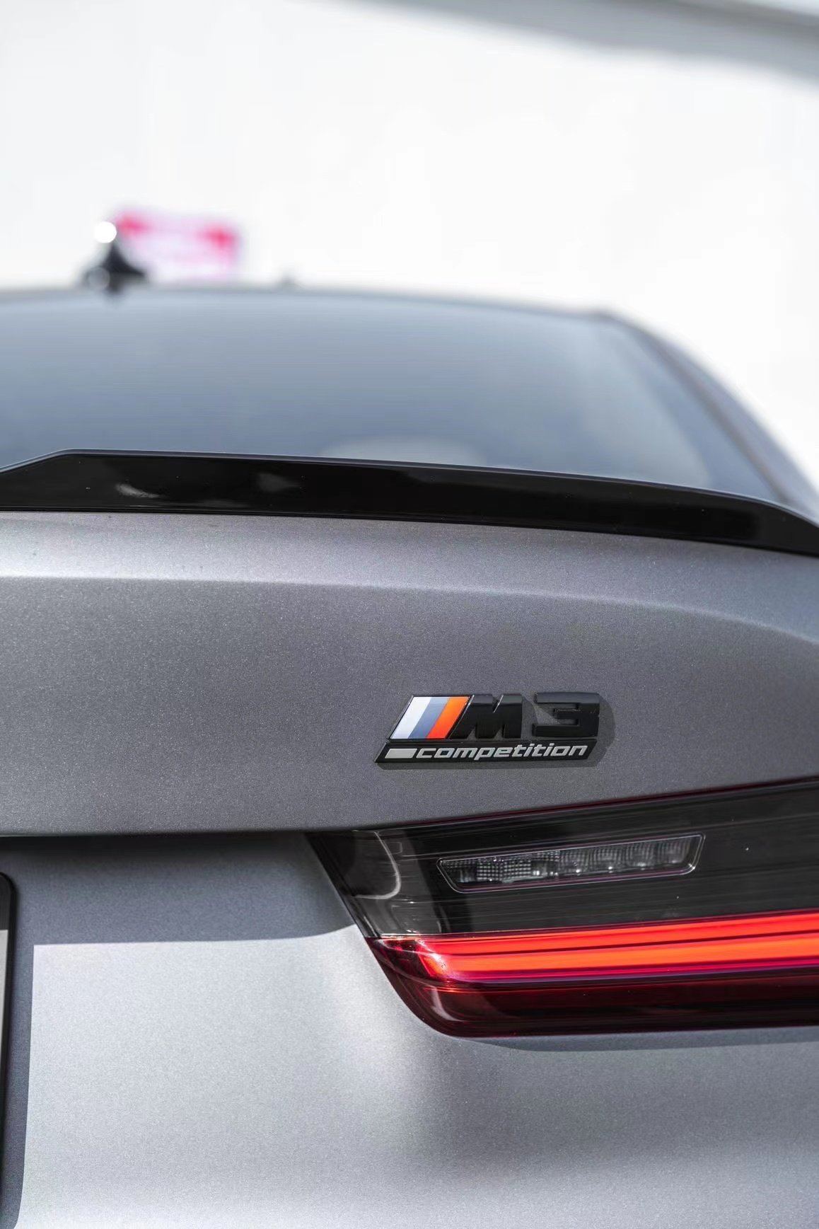 BMW M3 Matte Grey after Vinyl Wrap, rear body and taillight view