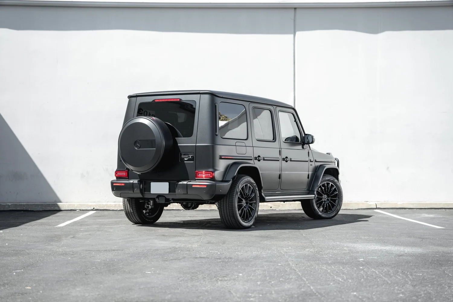 Mercedes-Benz G 550 after Matte PPF, Window Tint and Ceramic Coating, wide rear three-quarter view