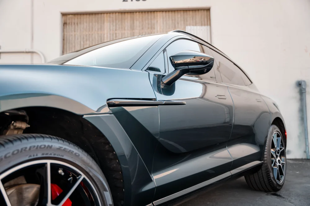 Close side view of the mirror, front fender and door contours.