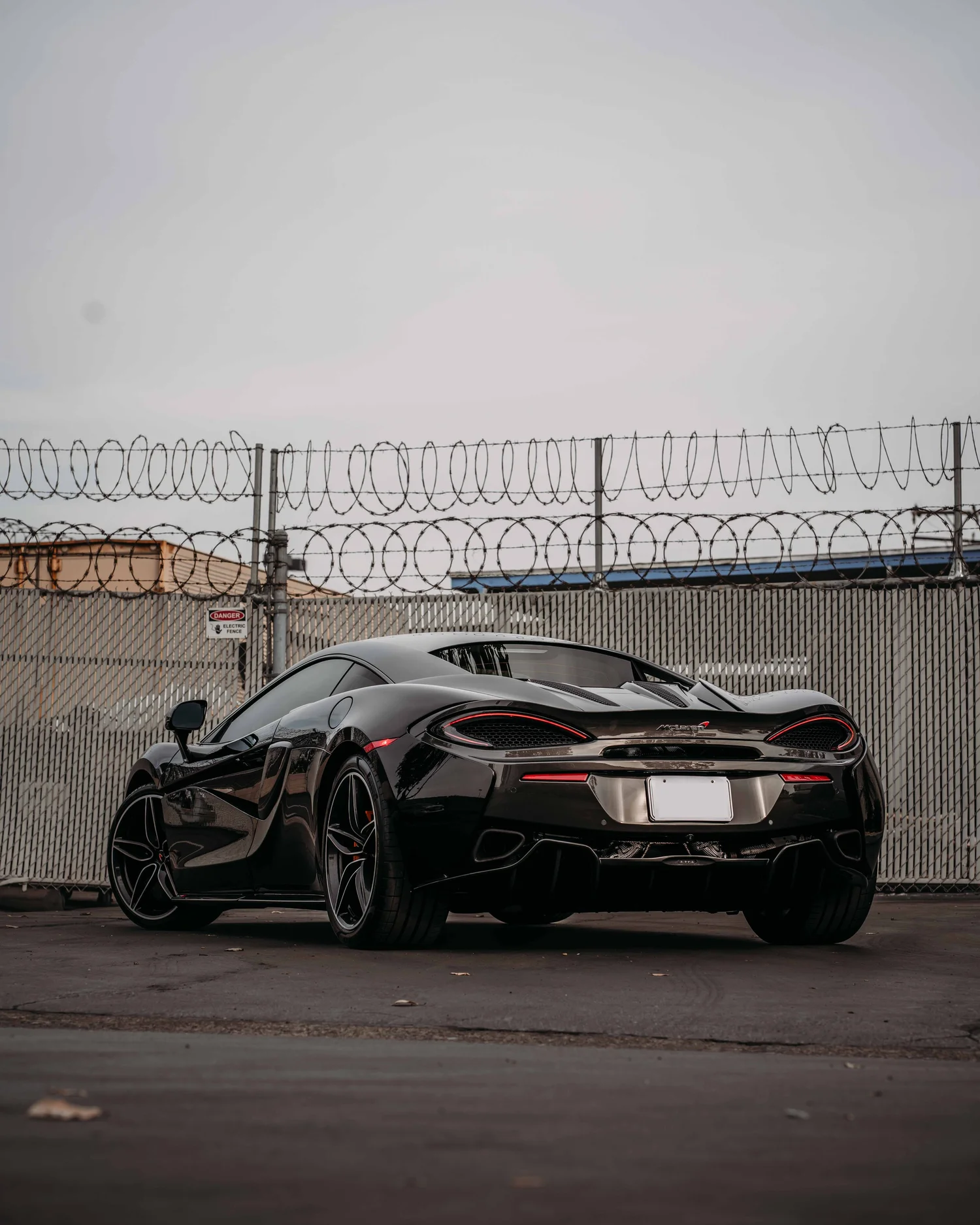 McLaren 570S after Paint Protection Film (PPF), Window Tint and Ceramic Coating, rear-right three-quarter view