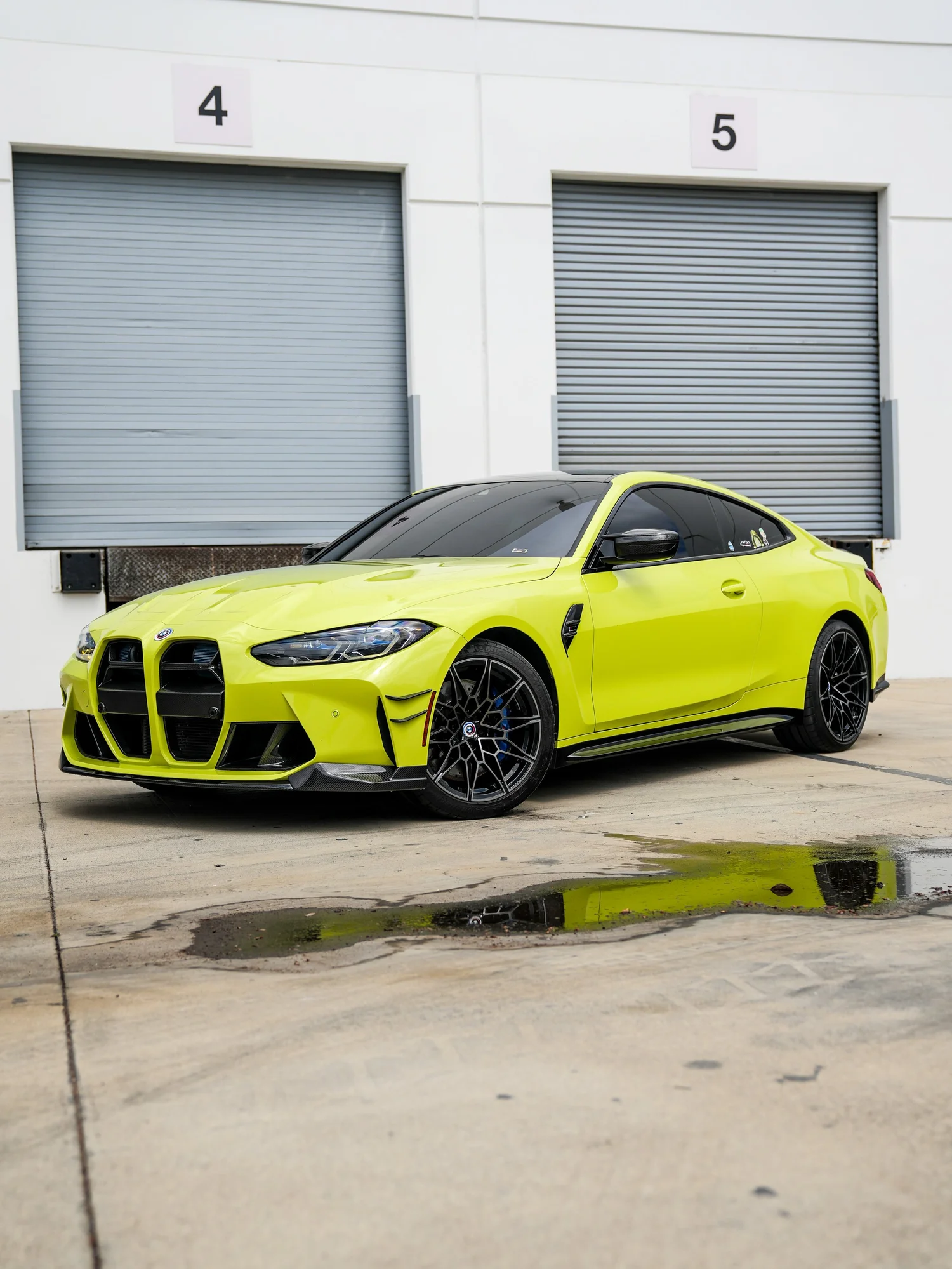 BMW M4 after Paint Protection Film (PPF), front-left three-quarter view