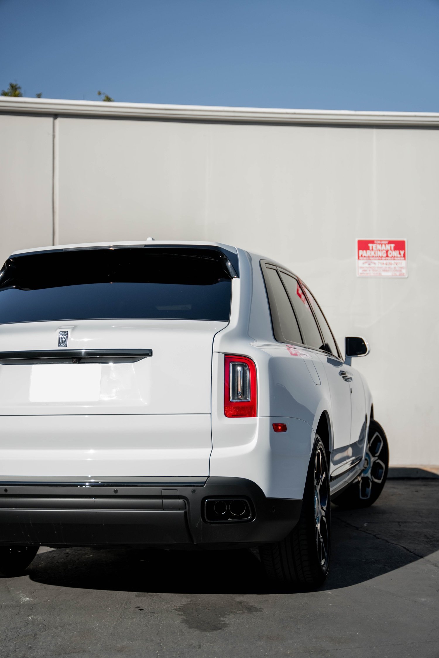White Rolls-Royce Cullinan after Paint Protection Film (PPF), Window Tint and Ceramic Coating, direct rear view