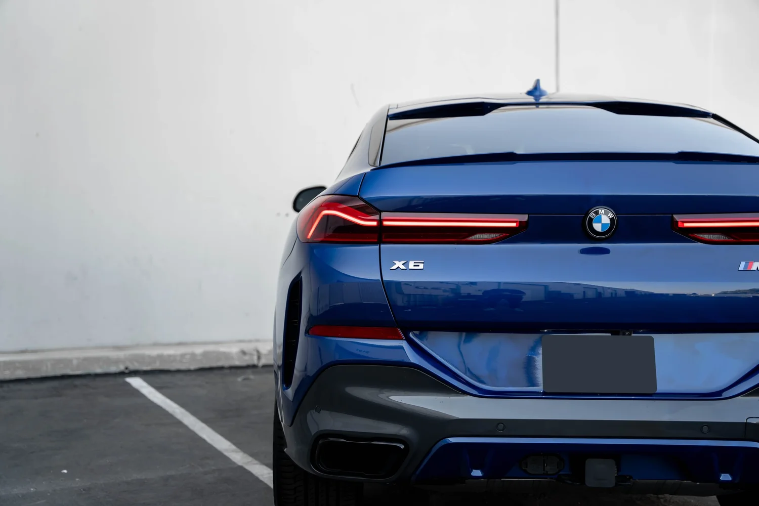 BMW X6 PPF after Paint Protection Film (PPF), rear body and taillight view