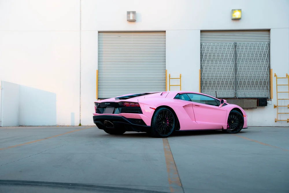Lamborghini Aventador side profile after Sakura Pink vinyl wrap