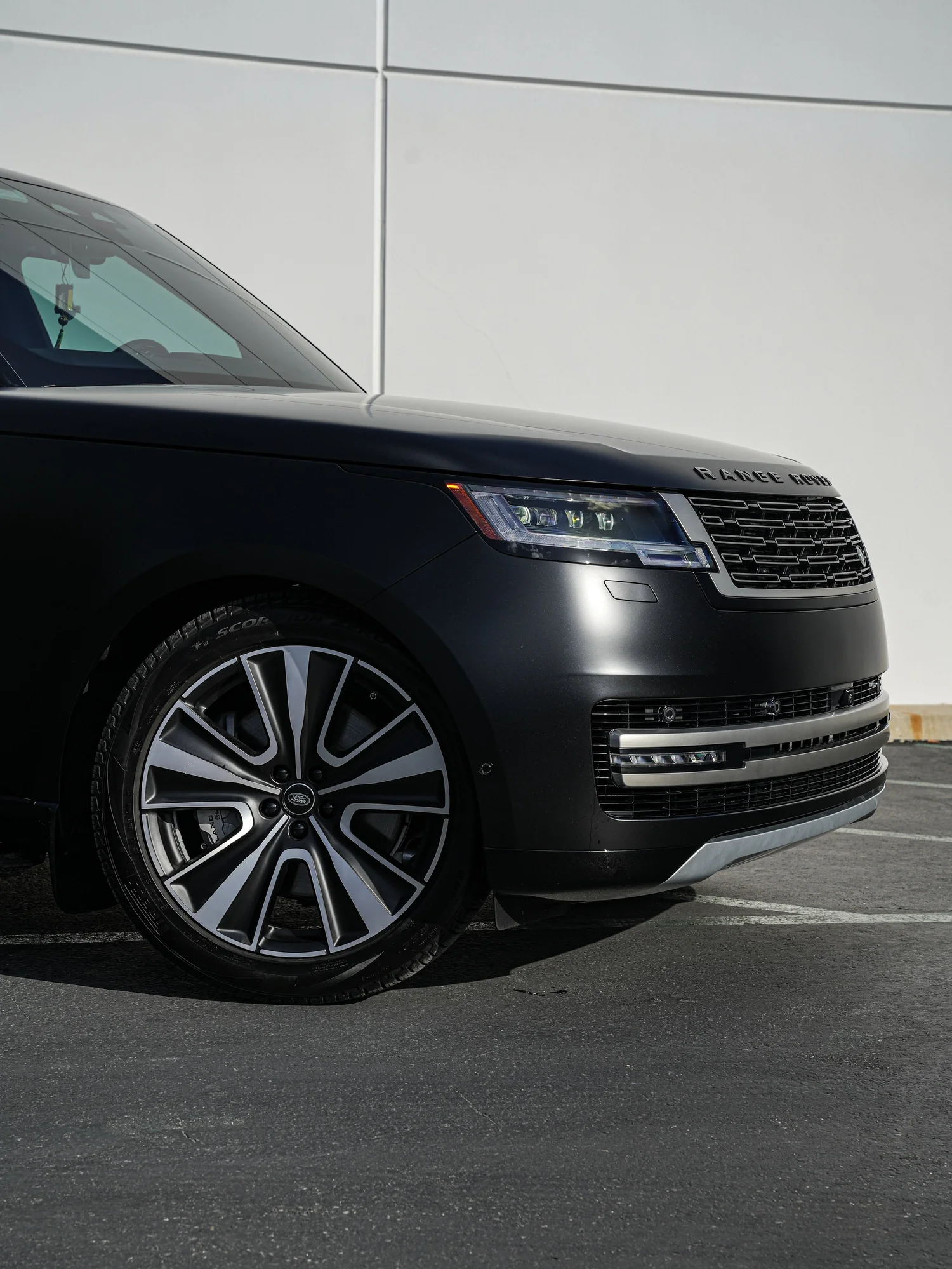 Range Rover after Matte PPF, Window Tint and Ceramic Coating, front wheel and body view