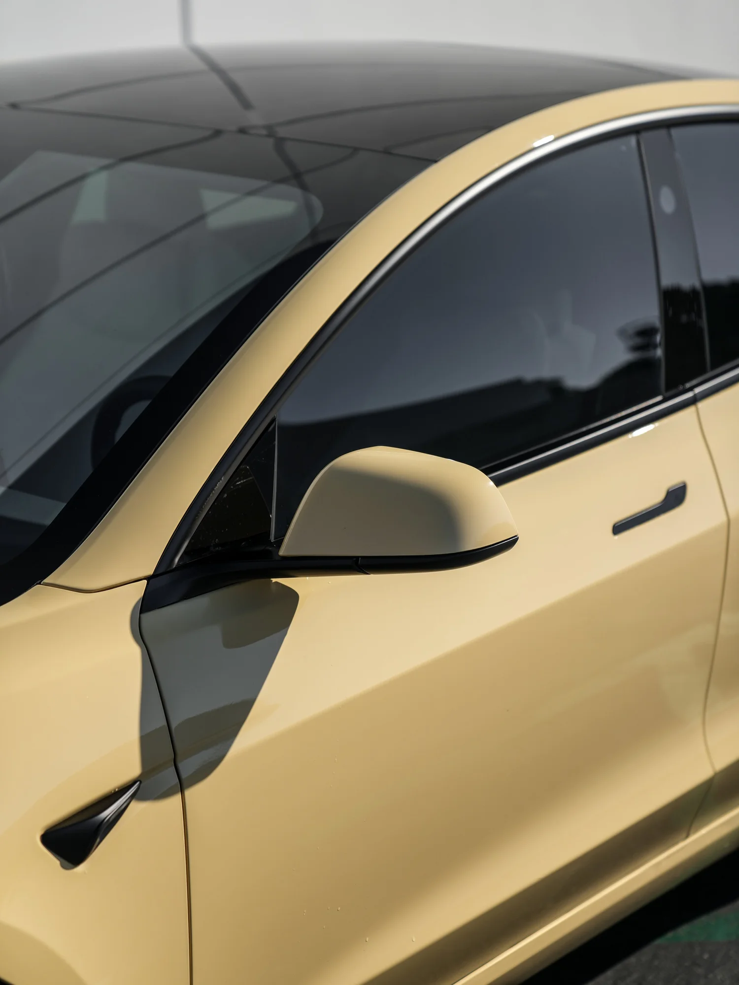 Tesla Model 3 Sunrise Yellow after Vinyl Wrap, side body-panel and door detail