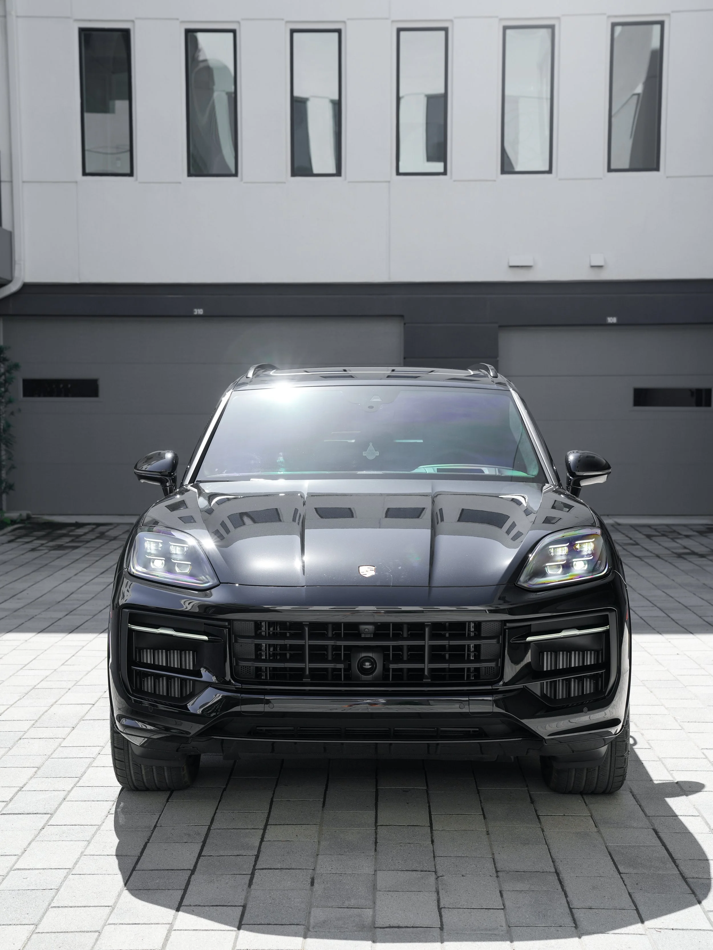 Porsche Cayenne GTS after paint protection film, window tint and ceramic coating in Irvine