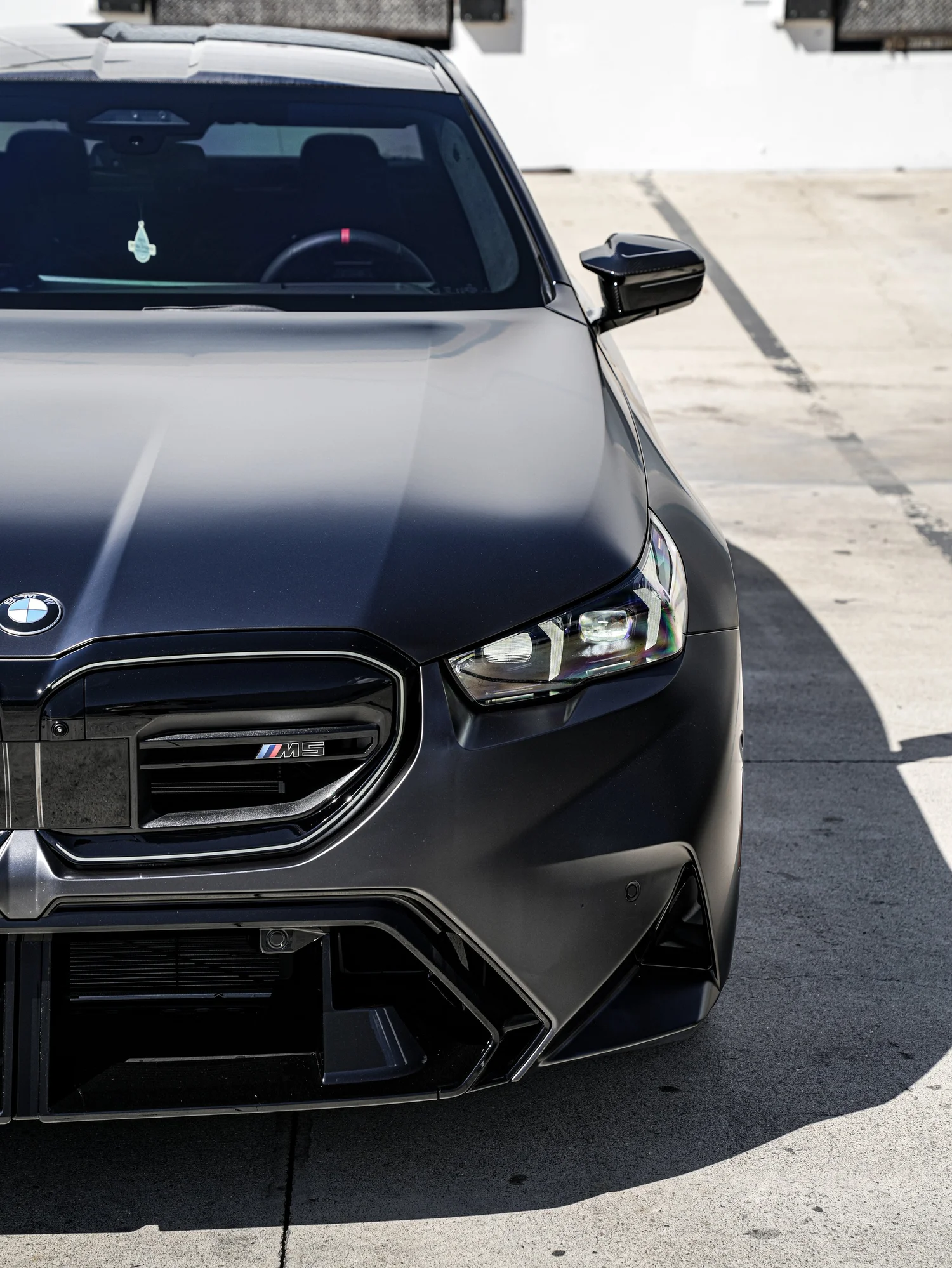 BMW G90 M5 after Matte PPF, Window Tint and Ceramic Coating, front-corner view