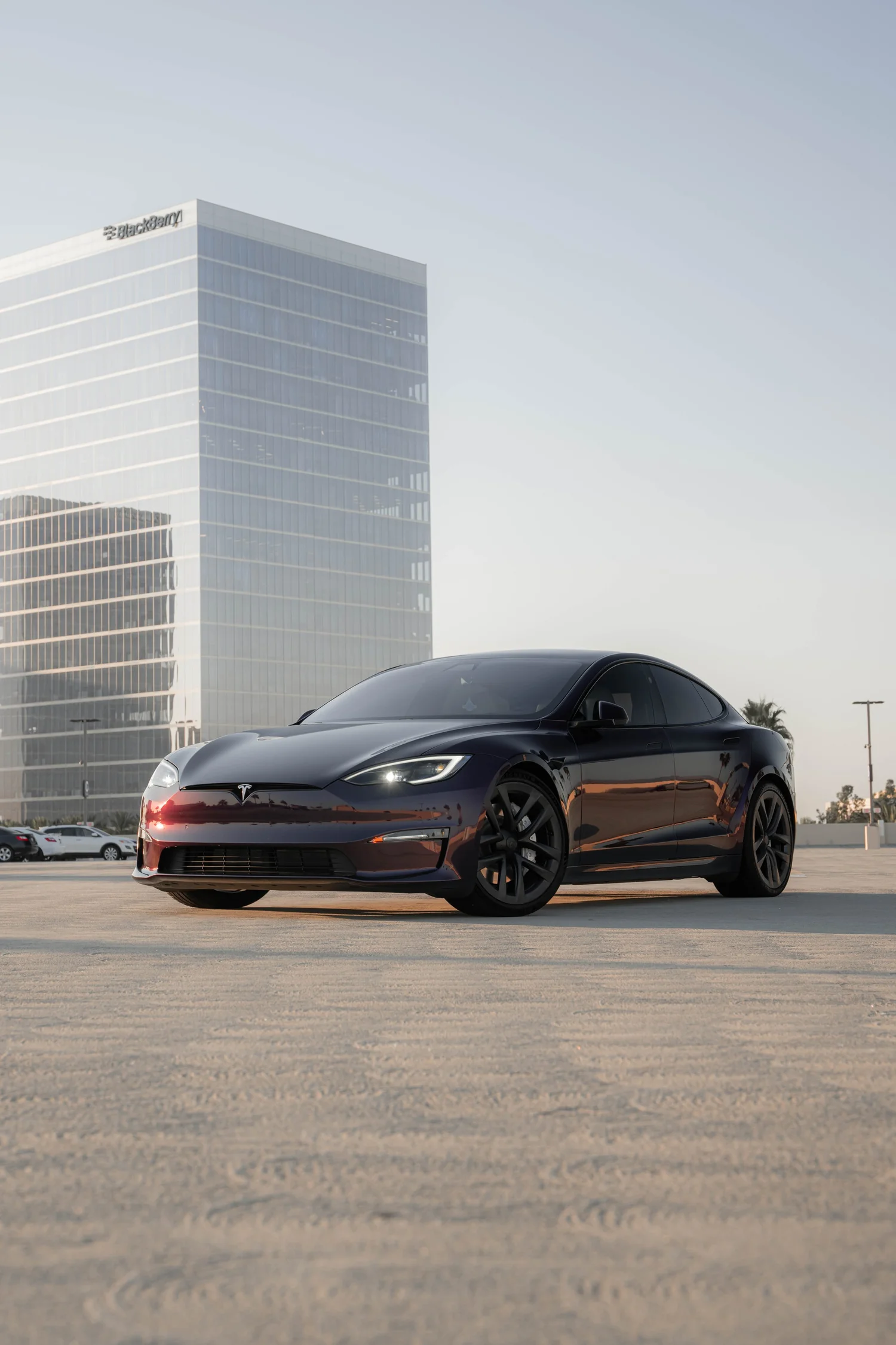 Tesla Model S Midnight Purple after Vinyl Wrap, front-right three-quarter view