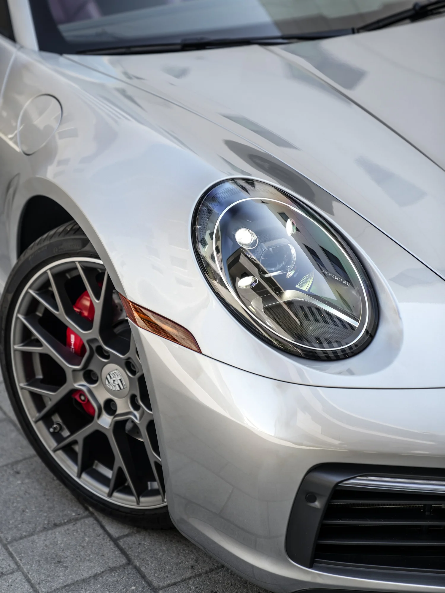 Porsche 911 after Paint Protection Film (PPF), front-corner view
