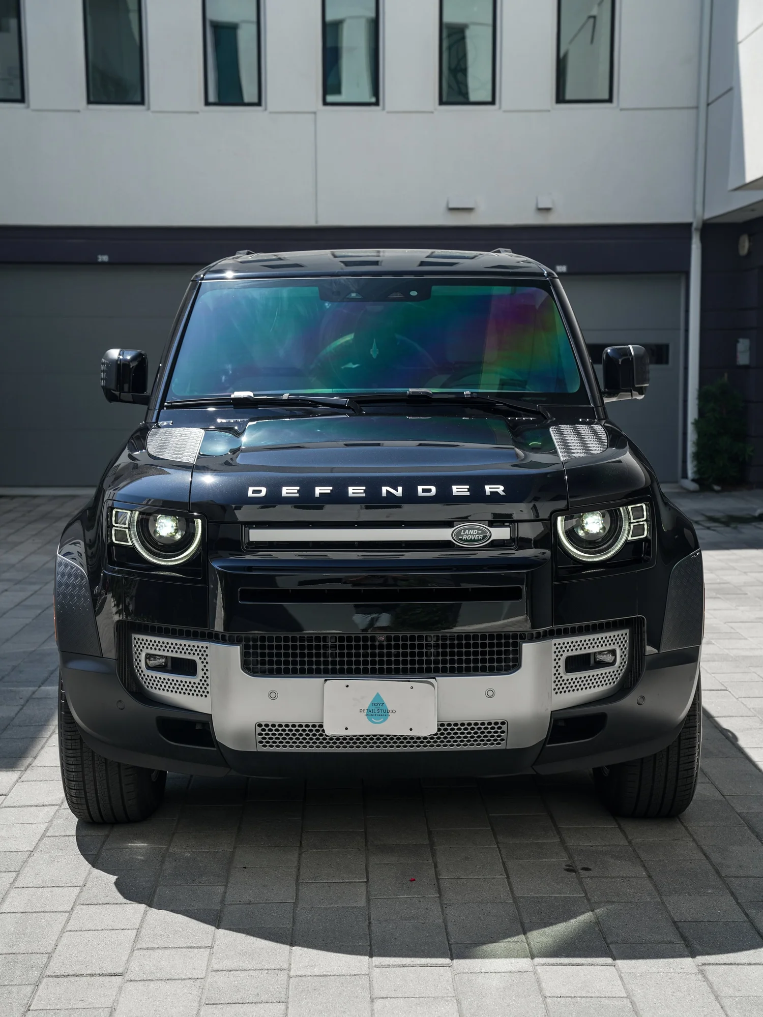 Land Rover Defender after Paint Protection Film (PPF) and Window Tint, direct front view