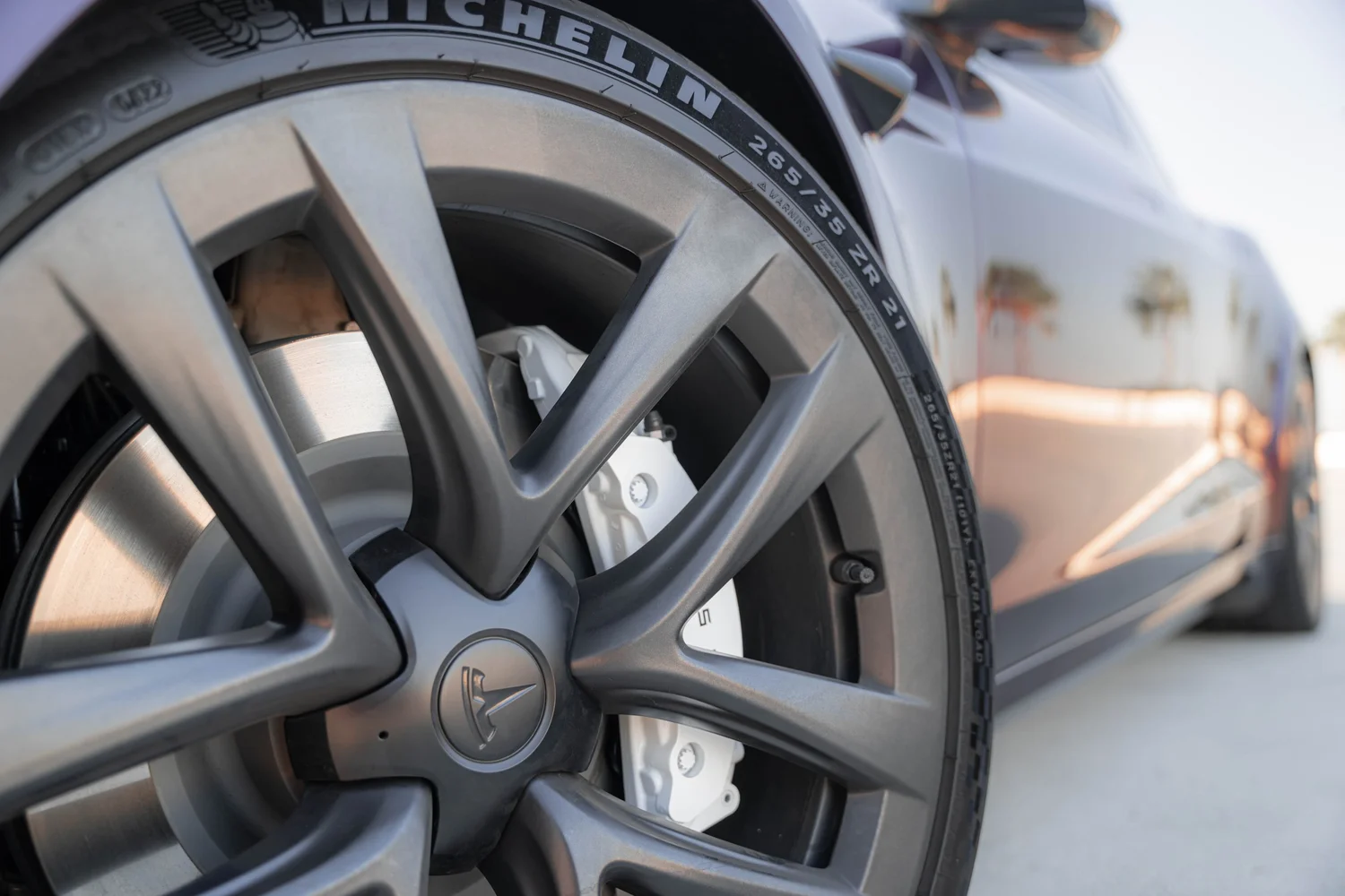 Tesla Model S Midnight Purple after Vinyl Wrap, wheel and brake caliper detail