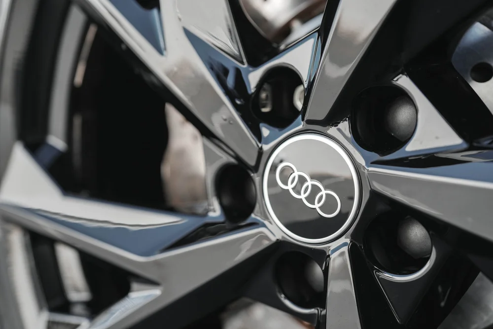 Black Audi R8 wheel spokes surrounding the Audi-ring center cap