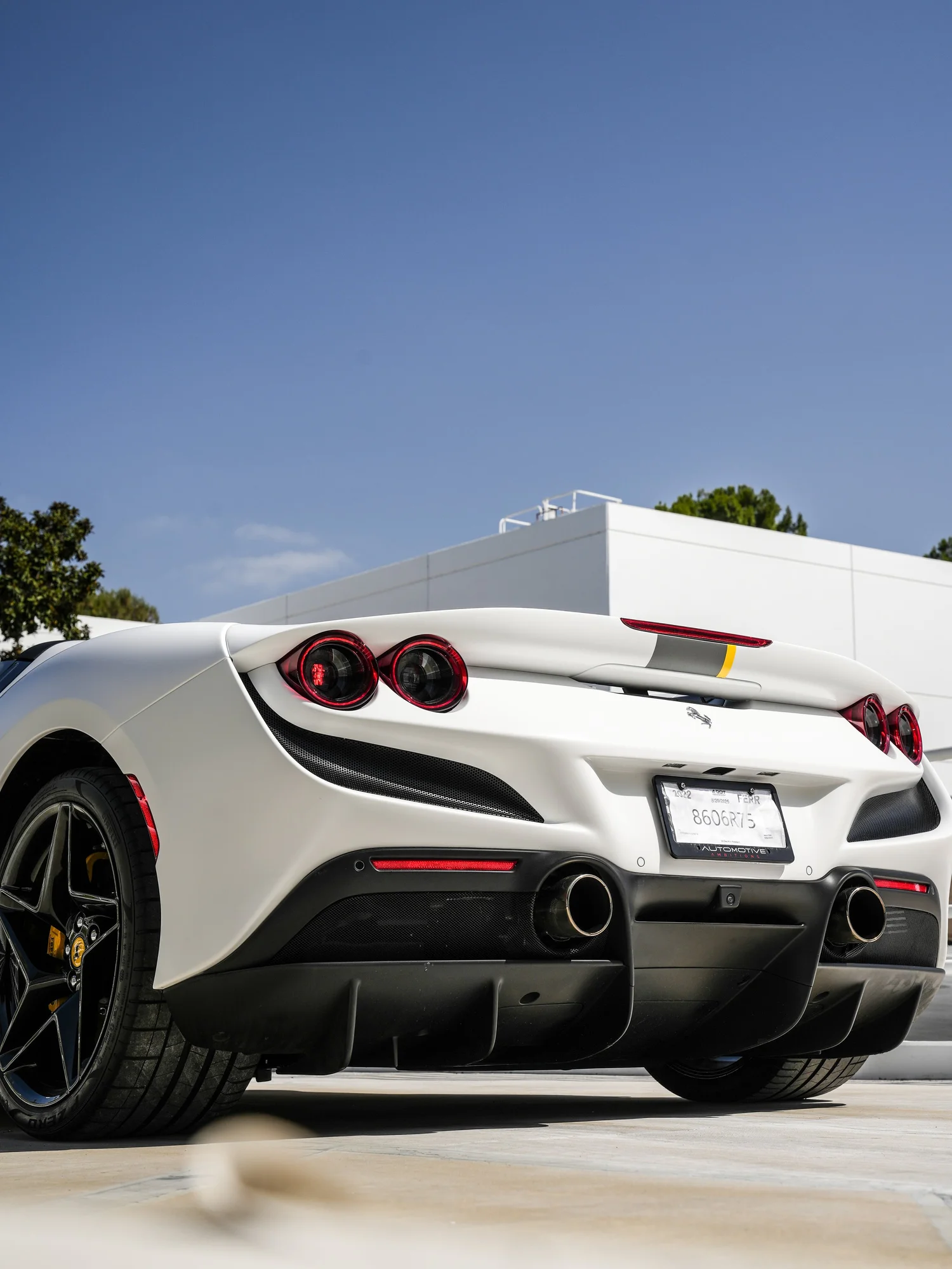 Ferrari F8 Spider after Matte PPF and Window Tint, low-angle rear view