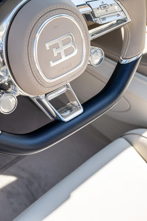 W16 Mistral steering-wheel center with the EB emblem, stitched grip and Mistral script on the lower spoke