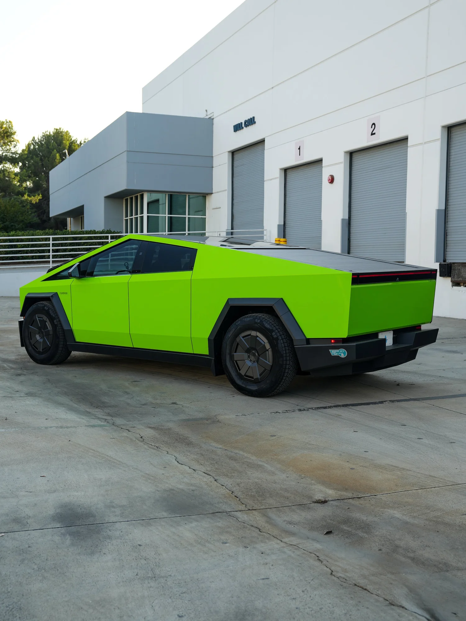 Tesla Cybertruck 3M Gloss Green after Vinyl Wrap, rear-left three-quarter view