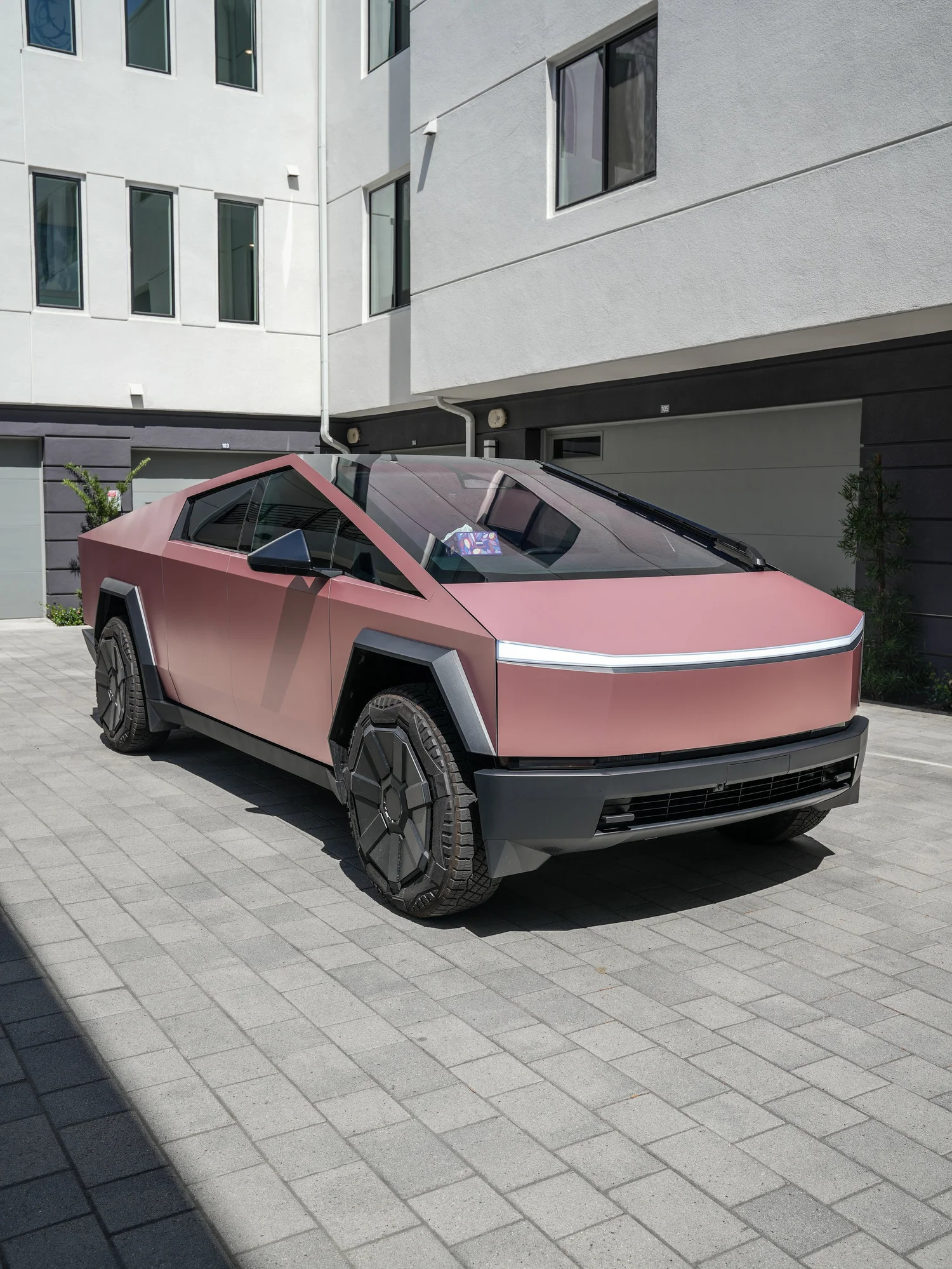 Tesla Cybertruck Matte Champagne Gold after Vinyl Wrap, front-right three-quarter view