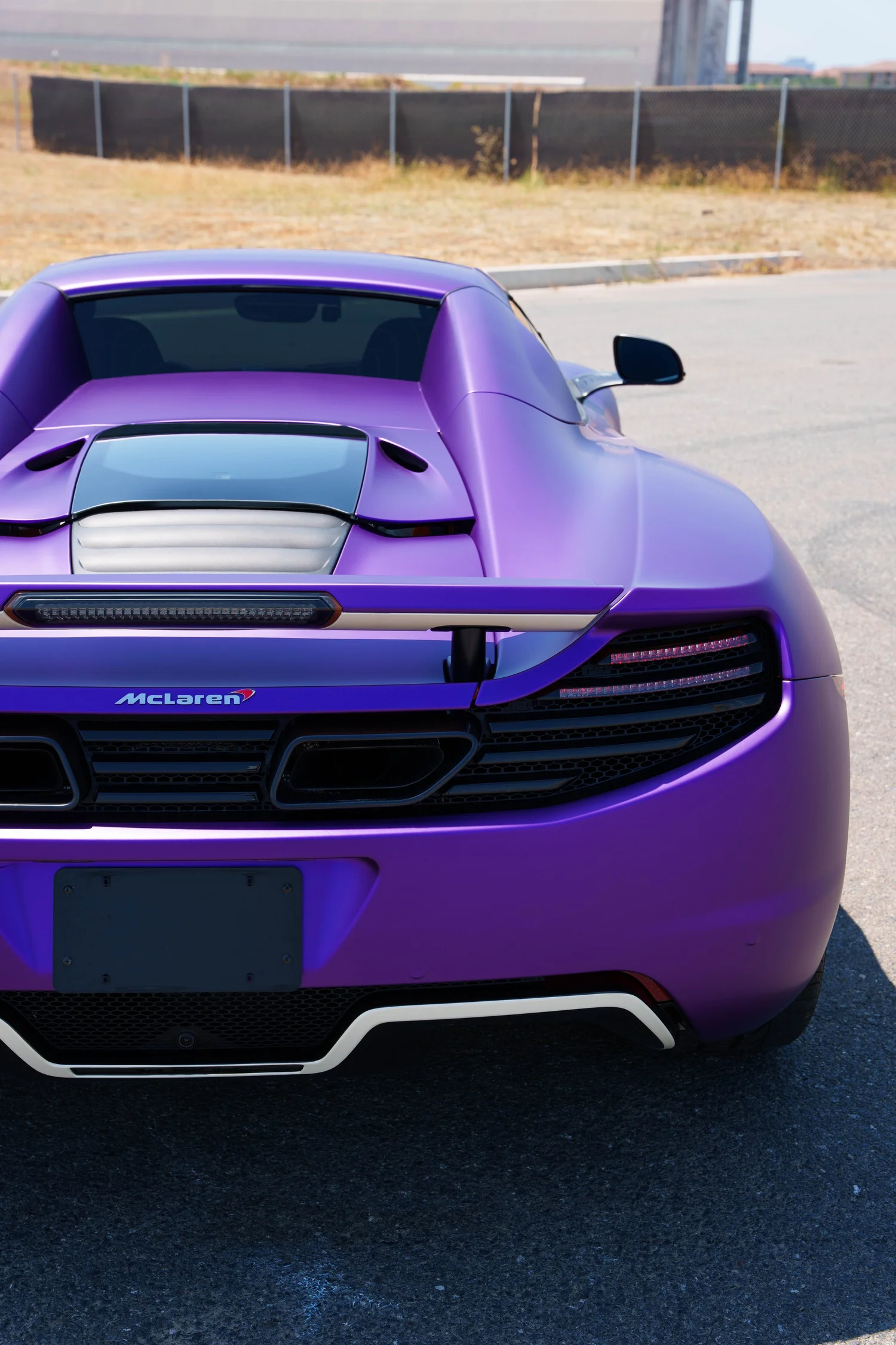 McLaren MP4-12C after Vinyl Wrap, low-angle front view
