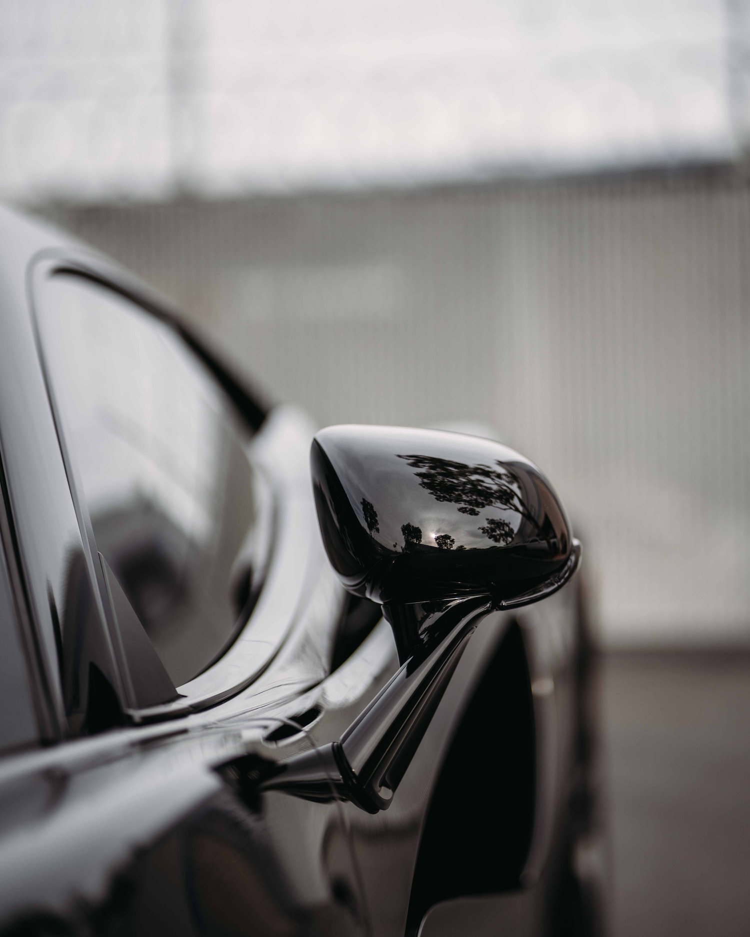 McLaren 570S after Paint Protection Film (PPF), Window Tint and Ceramic Coating, paint-reflection close-up