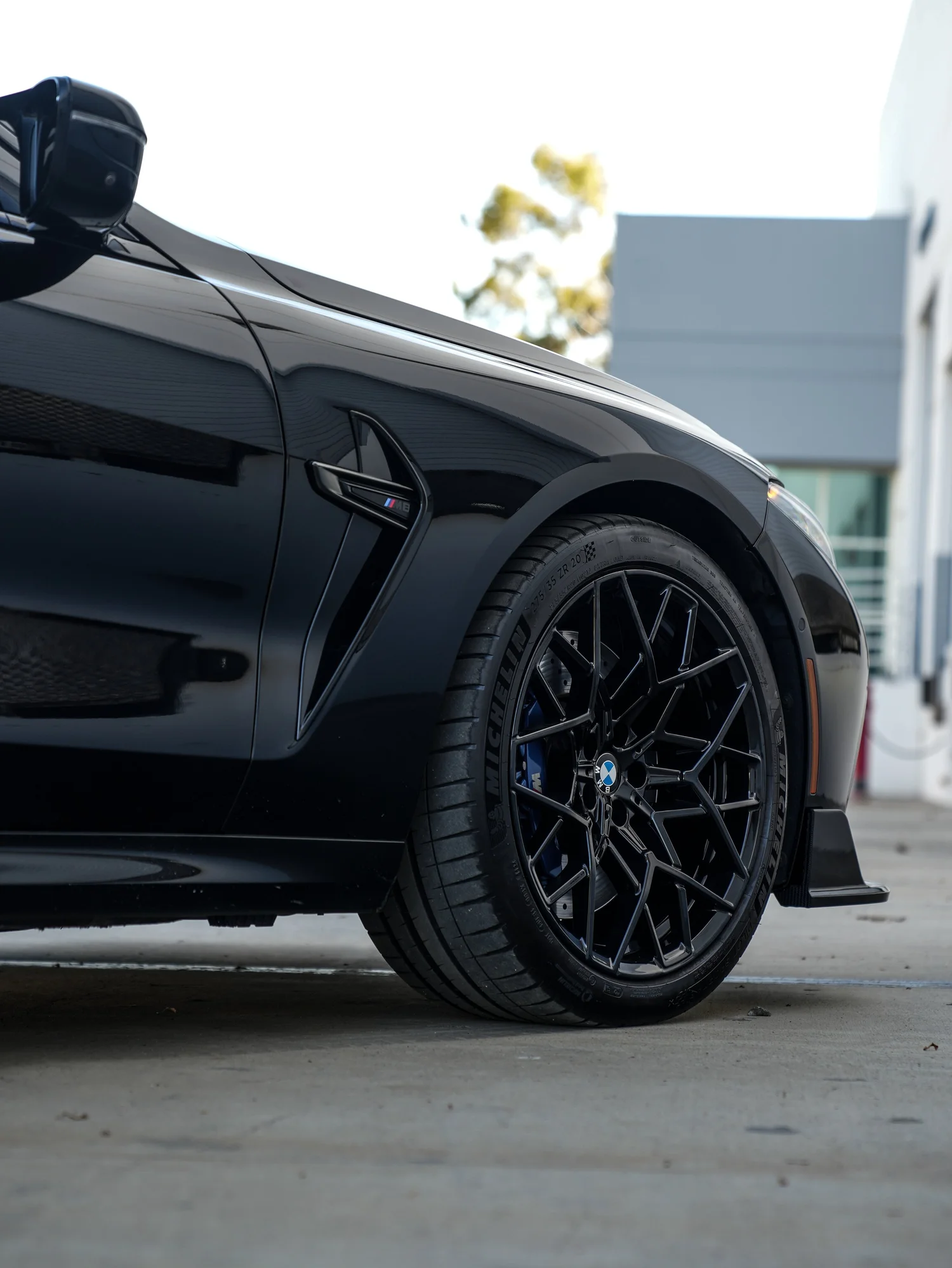 BMW M8 front wheel and fender detail