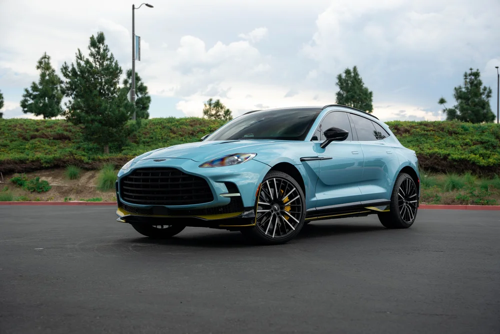 Aston Martin DBX 707 complete front three-quarter exterior with headlights