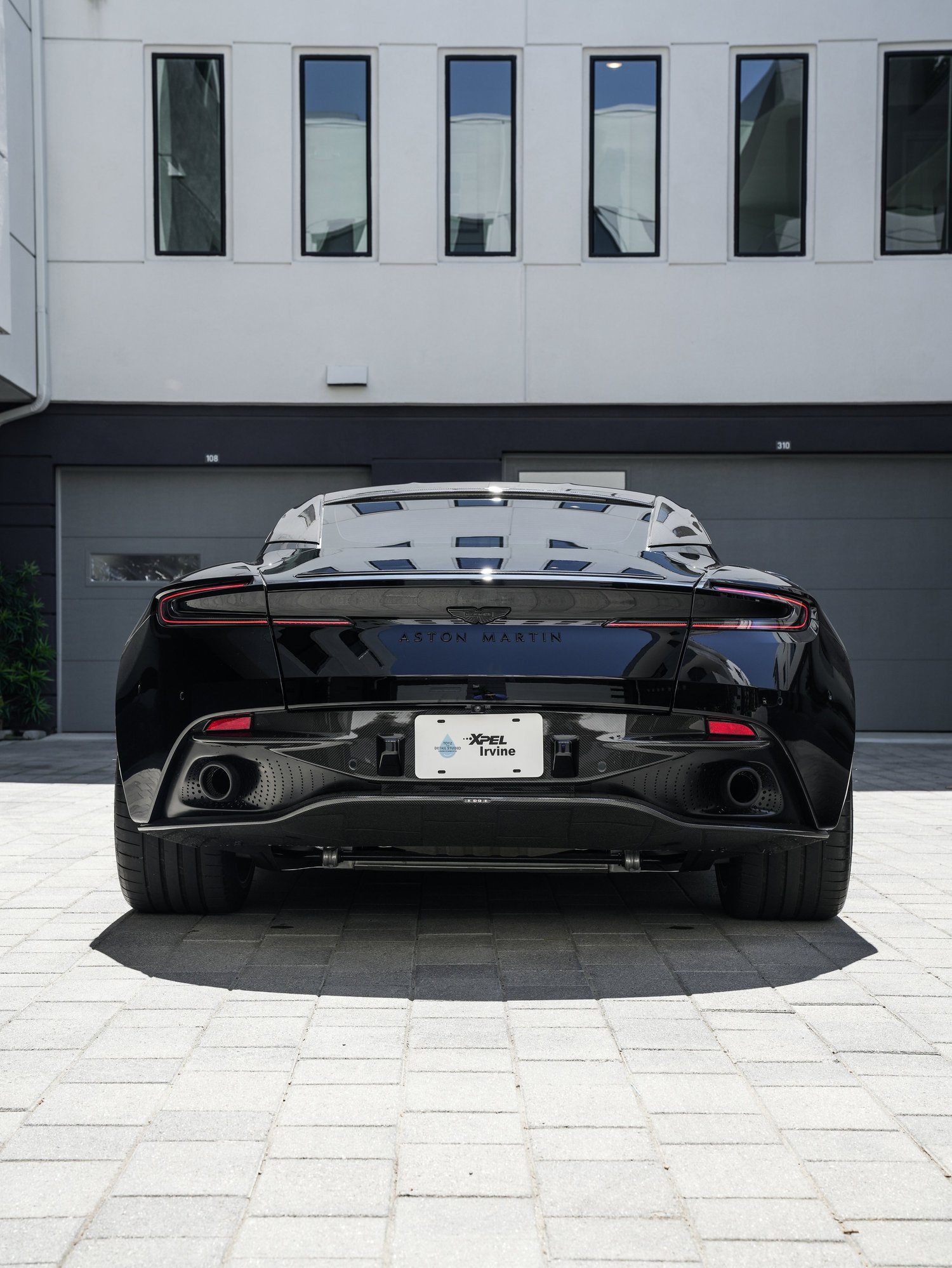 Aston Martin DB12 centered rear view after full exterior PPF, window tint and ceramic coating