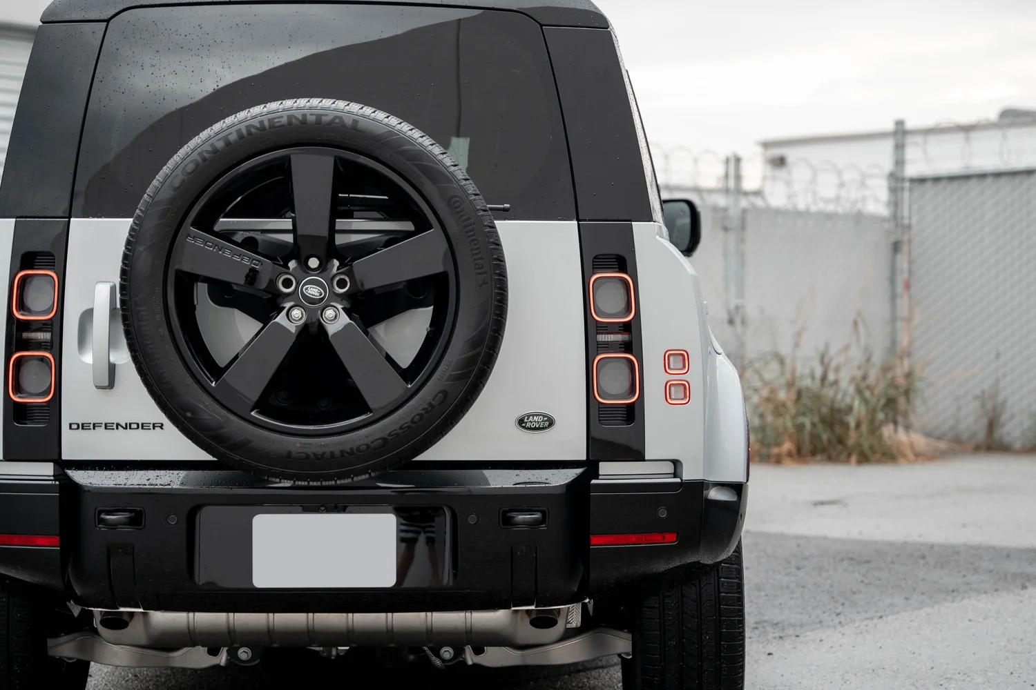 Land Rover Defender after Paint Protection Film (PPF), Window Tint and Ceramic Coating, rear-quarter and wheel view