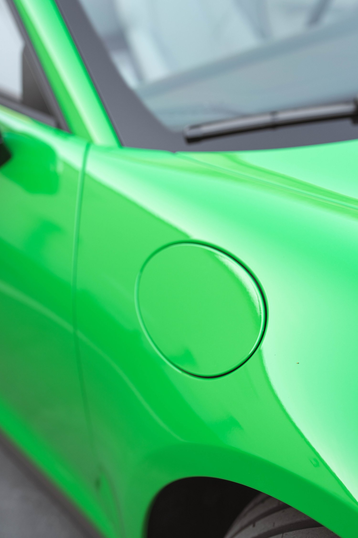 Signal Green Porsche 911 Turbo S after Paint Protection Film (PPF), Window Tint and Ceramic Coating, paint-reflection close-up