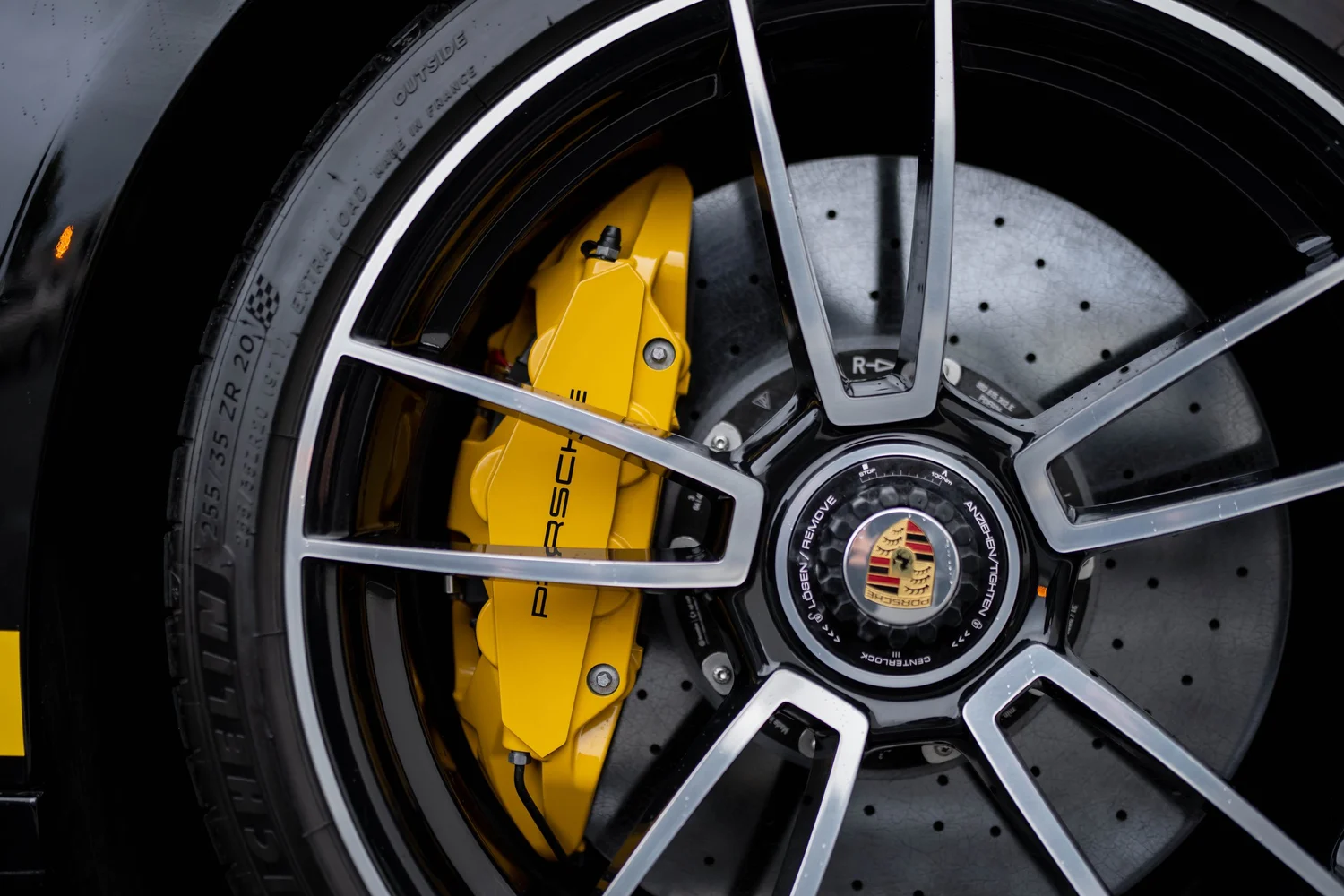 Center-lock wheel and yellow brake caliper detail