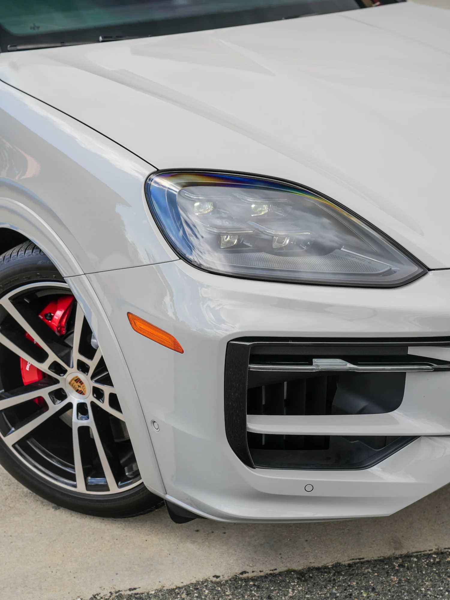 Light Grey Porsche Cayenne GTS after Paint Protection Film (PPF), Window Tint and Ceramic Coating, front-corner view