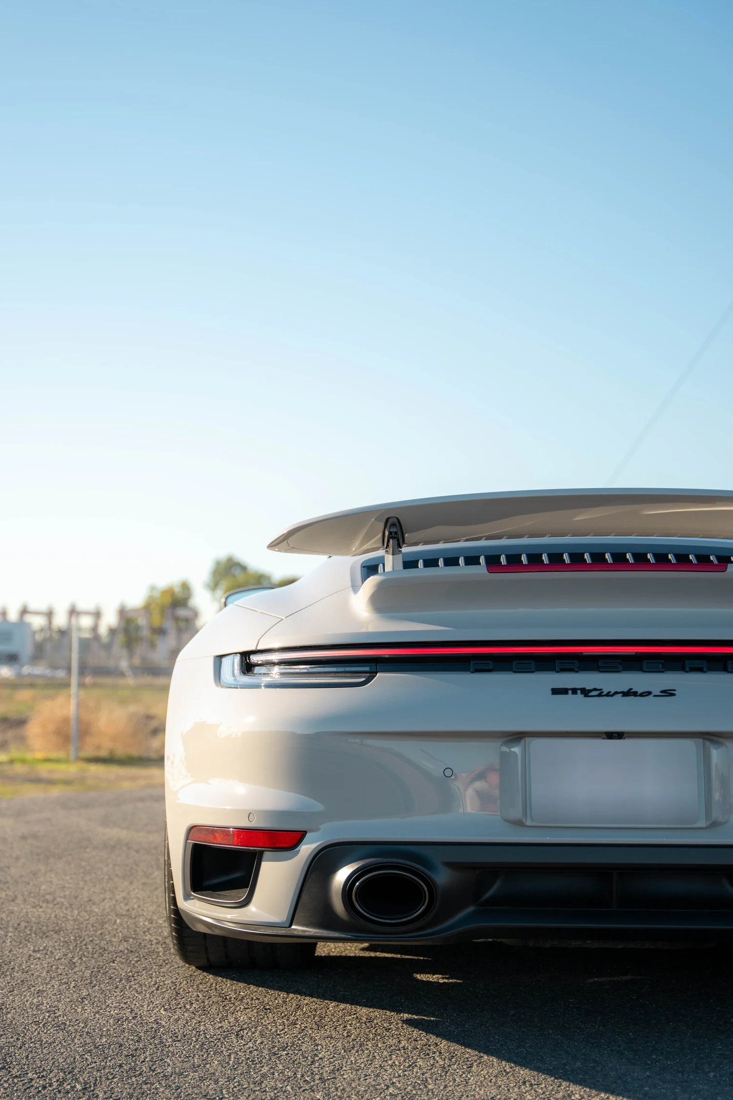 Chalk Porsche 911 Turbo S after Paint Protection Film (PPF), Window Tint and Ceramic Coating, rear body and taillight view