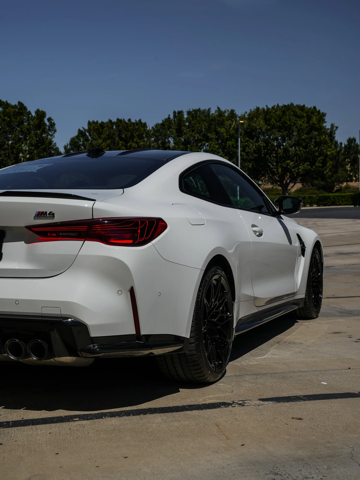 BMW G82 M4 after Paint Protection Film (PPF), rear-right three-quarter view