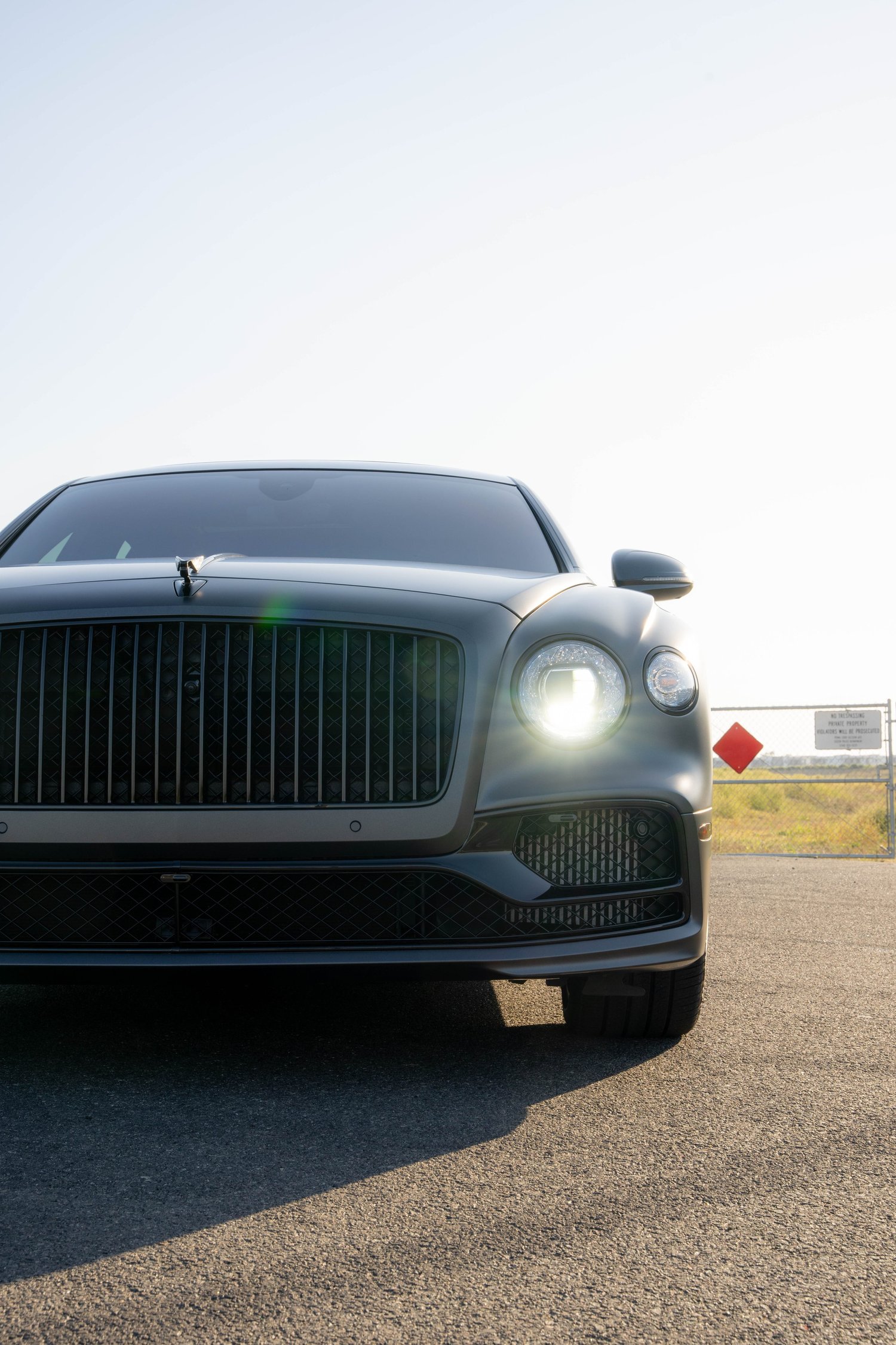 Bentley Flying Spur after Paint Protection Film (PPF), Window Tint and Ceramic Coating, low-angle front view