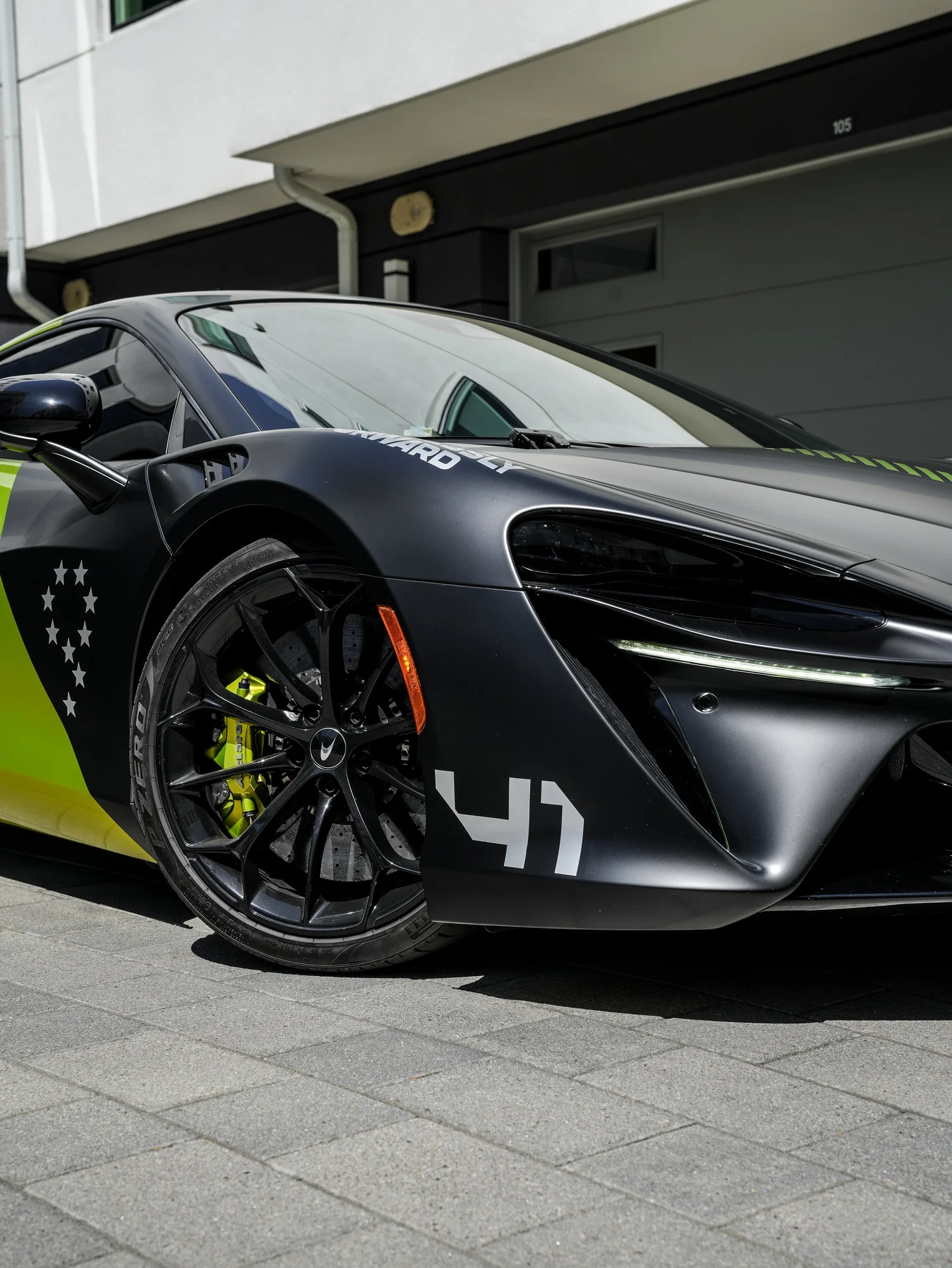McLaren Artura MCL38 Tribute Custom Wrap after Window Tint, Vinyl Wrap and Custom Graphics, front wheel and body view