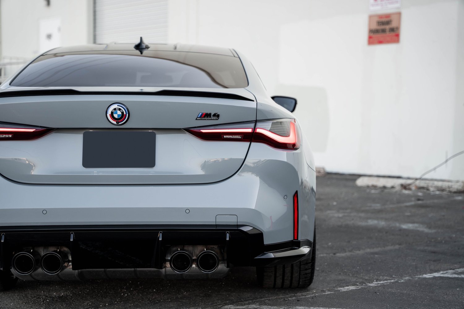 BMW M4 after Paint Protection Film (PPF), Window Tint and Ceramic Coating, rear diffuser and exhaust detail