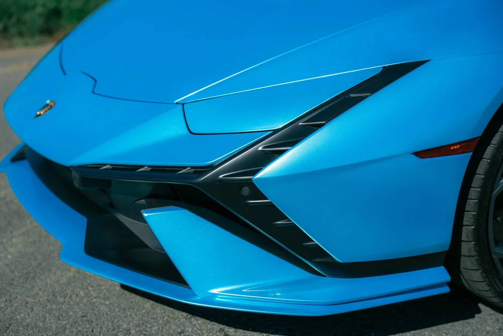 Blue Lamborghini Huracán Tecnica hood, angular headlight and black front-bumper elements