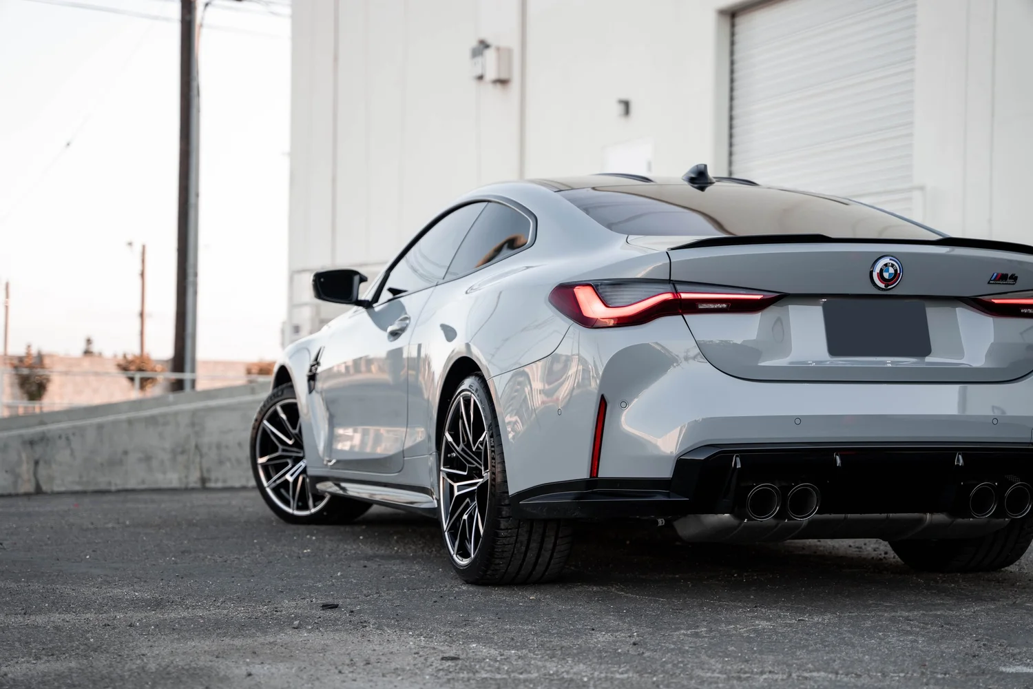 BMW M4 after Paint Protection Film (PPF), Window Tint and Ceramic Coating, rear-quarter and wheel view