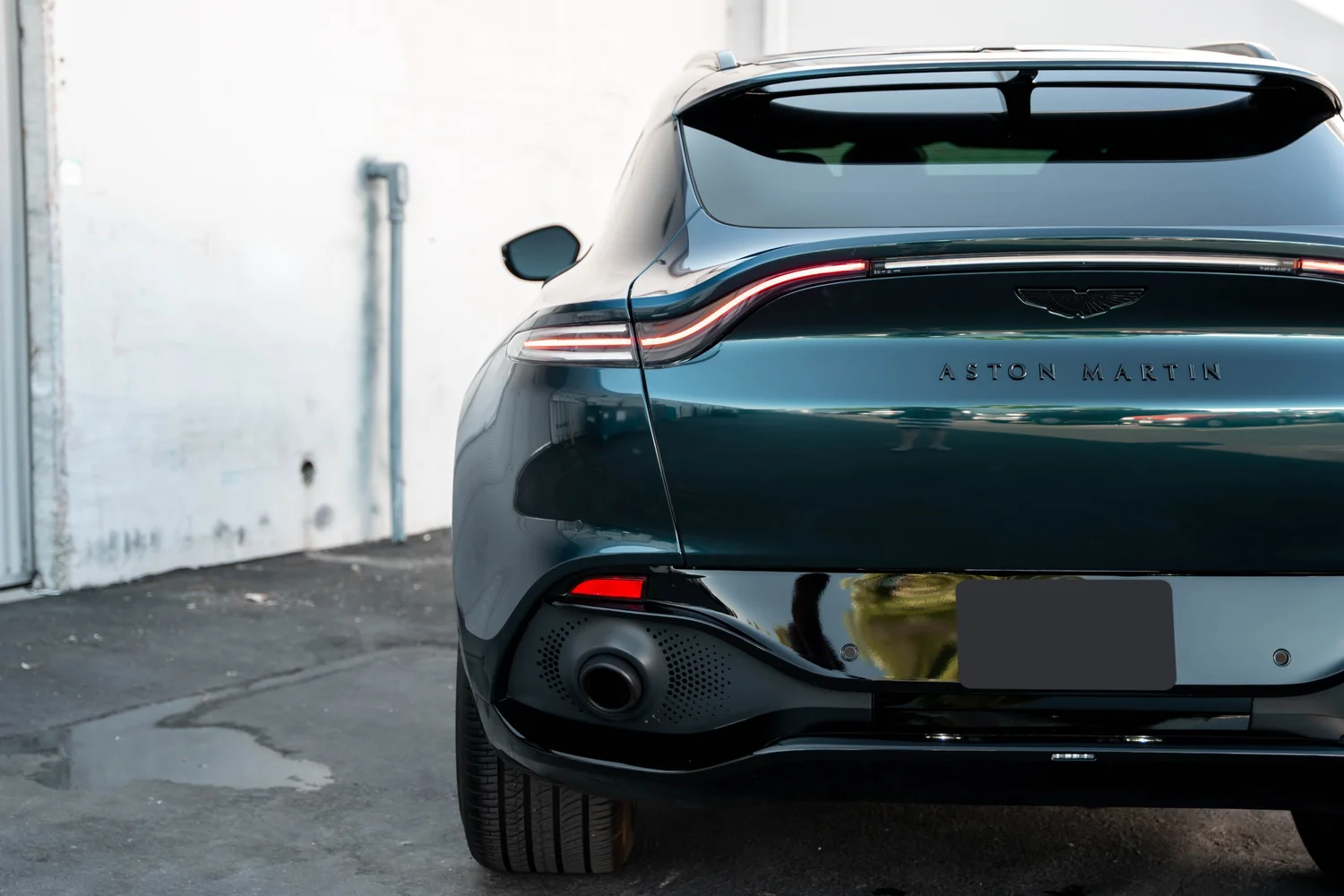 Aston Martin DBX after Paint Protection Film (PPF), Window Tint and Ceramic Coating, rear body and taillight view