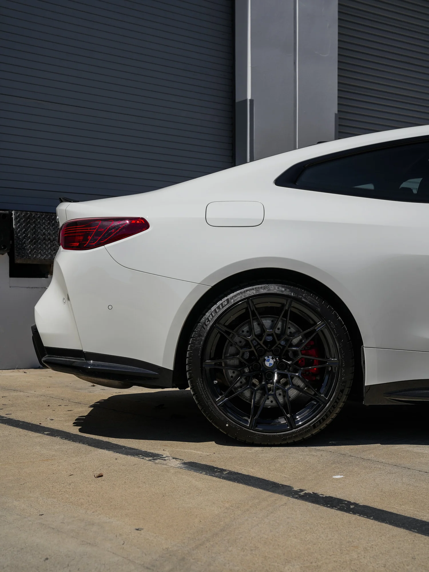 BMW G82 M4 after Paint Protection Film (PPF), rear-quarter and wheel view