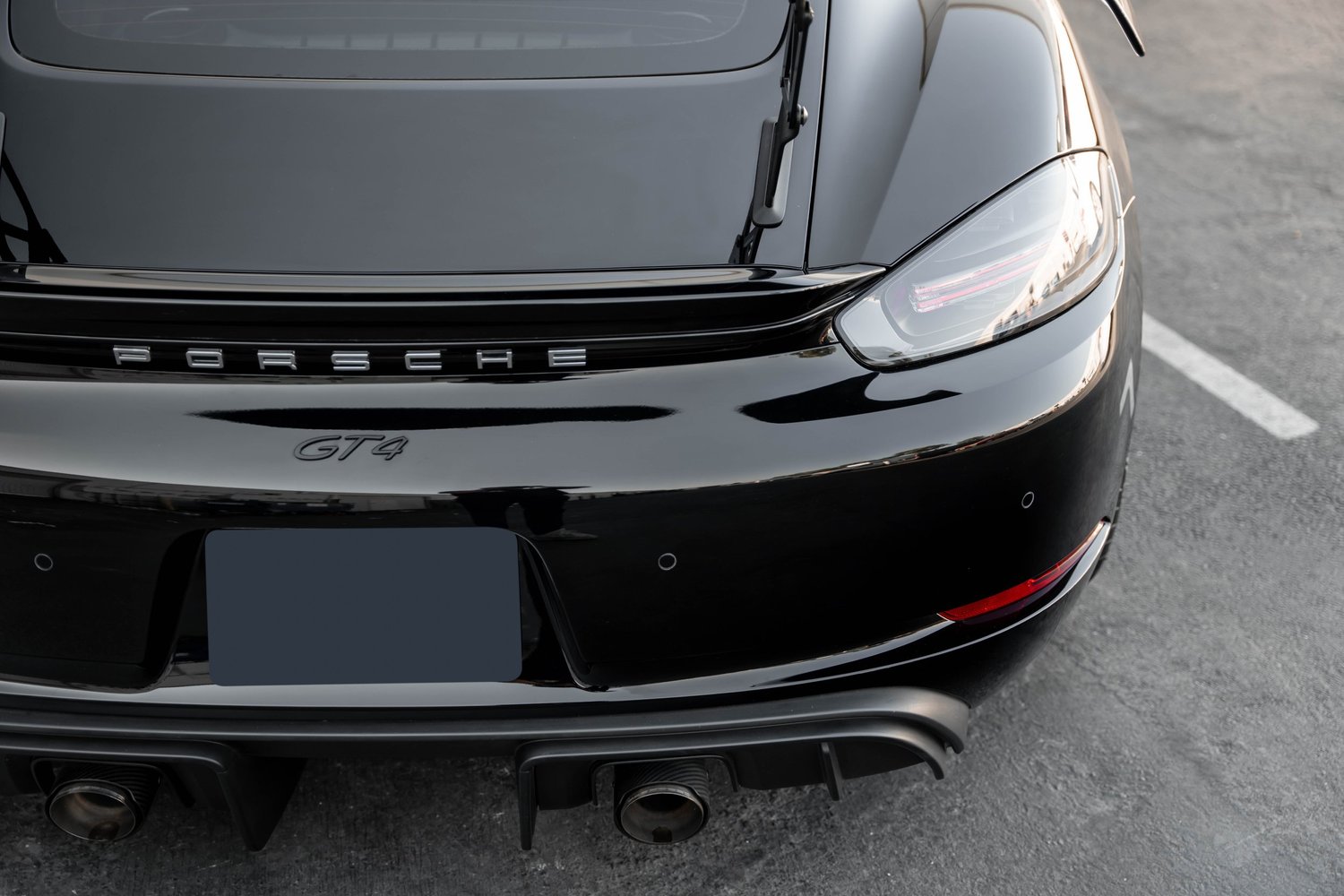 Porsche 718 Cayman GT4 after Paint Protection Film (PPF), Window Tint and Ceramic Coating, front-corner view