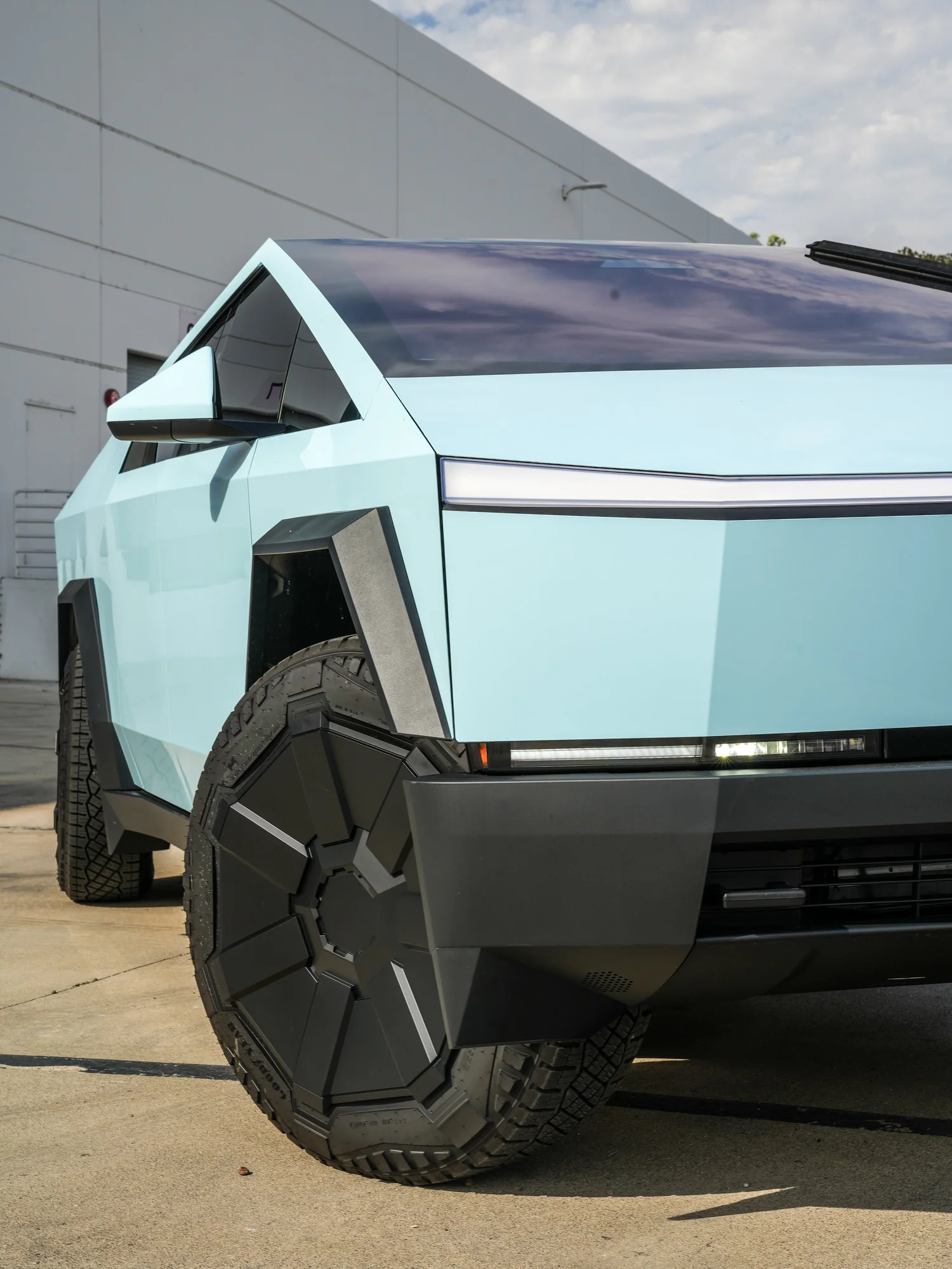 Tesla Cybertruck Permafrost Blue PPF after Paint Protection Film (PPF), front wheel and body view