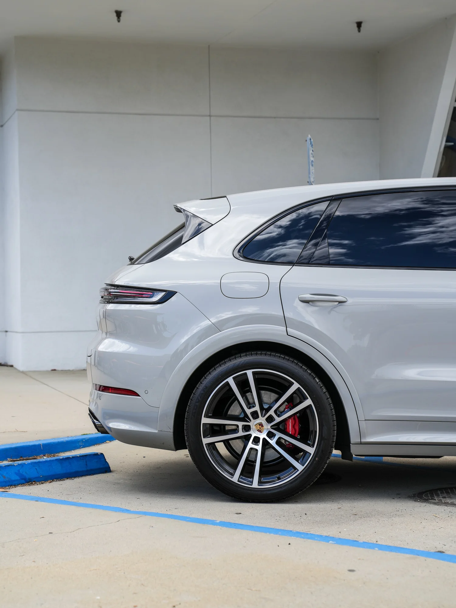 Light Grey Porsche Cayenne GTS after Paint Protection Film (PPF), Window Tint and Ceramic Coating, rear-left three-quarter view