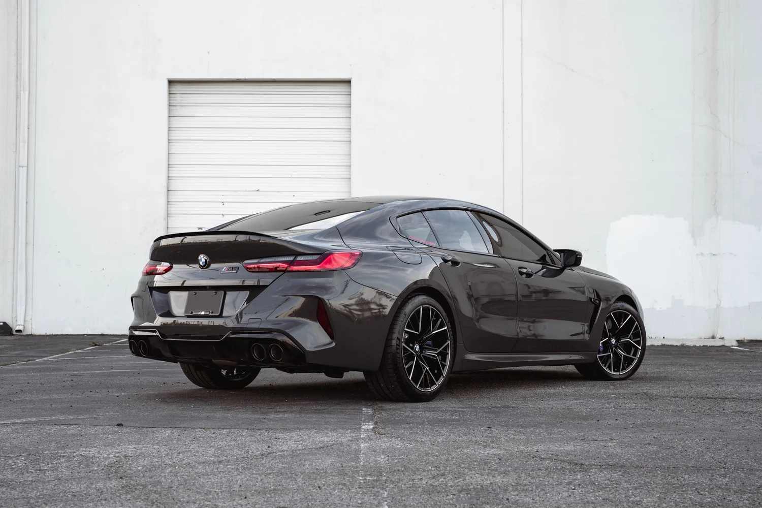 BMW M8 after Paint Protection Film (PPF), Window Tint and Ceramic Coating, rear-left three-quarter view