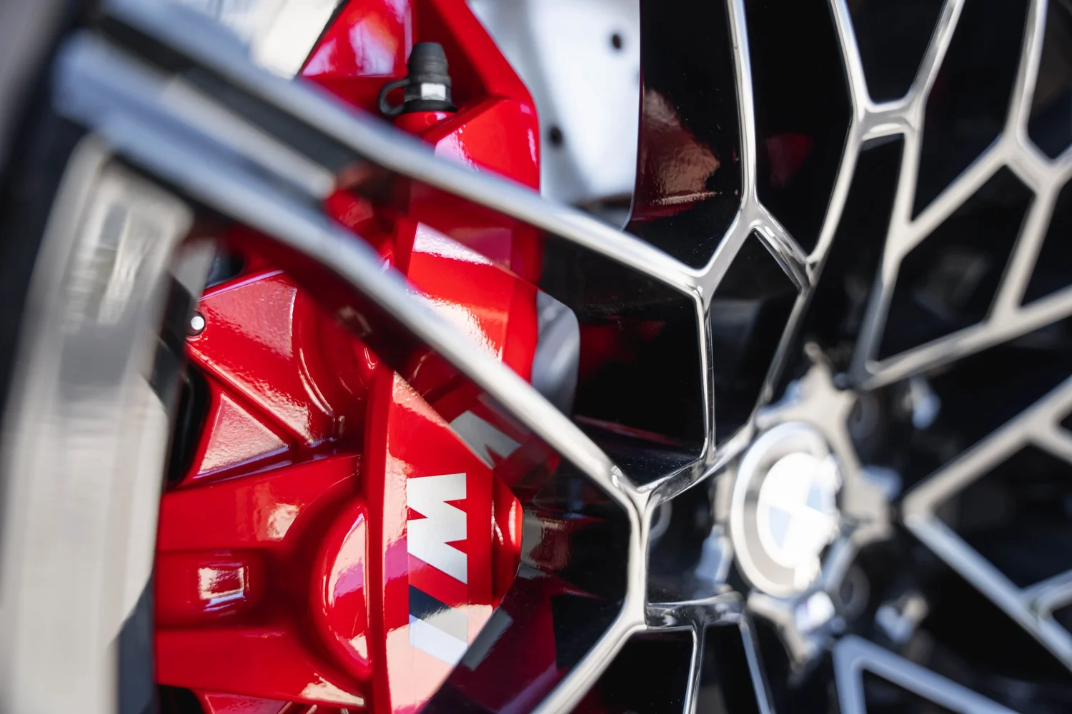 BMW M3 red brake-caliper and wheel detail