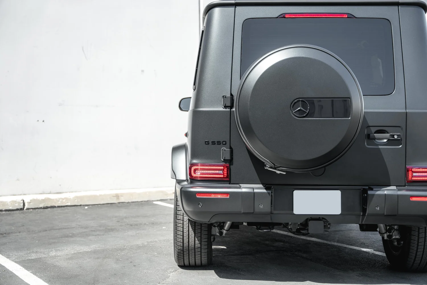 Mercedes-Benz G 550 after Matte PPF, Window Tint and Ceramic Coating, rear-quarter and wheel view
