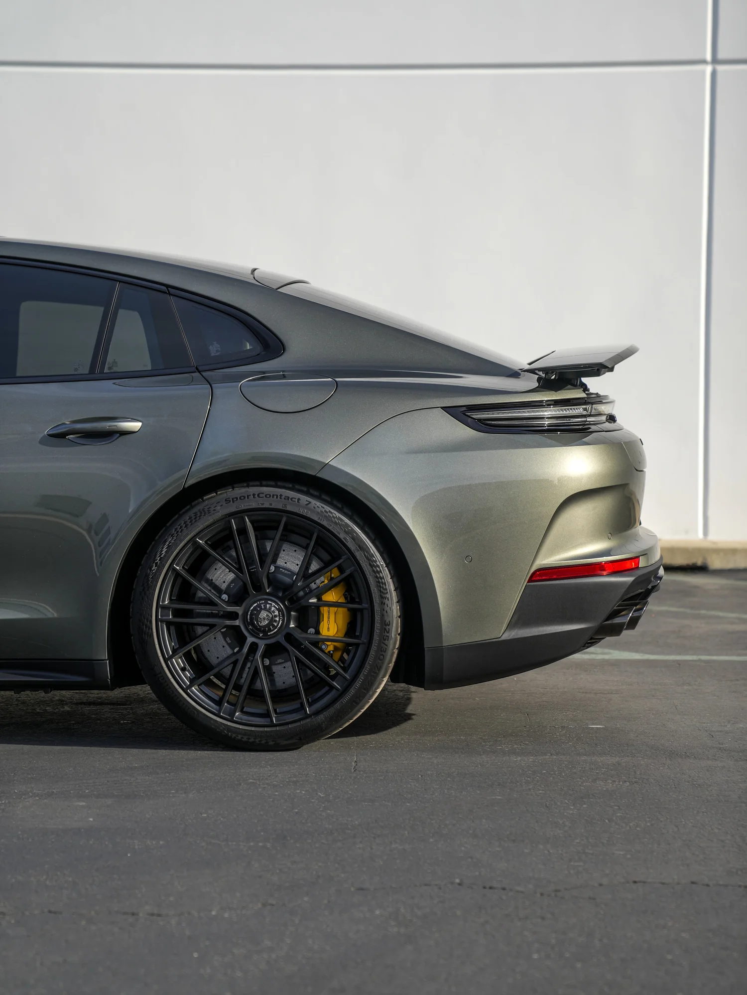 Porsche Panamera Turbo S after Paint Protection Film (PPF), Window Tint and Ceramic Coating, rear-quarter and wheel view