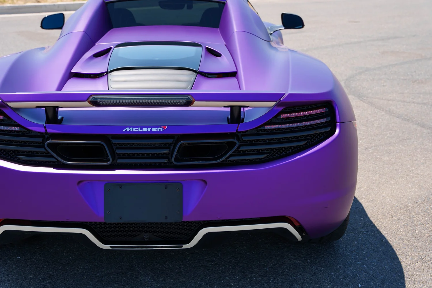McLaren MP4-12C after Vinyl Wrap, rear body and taillight view