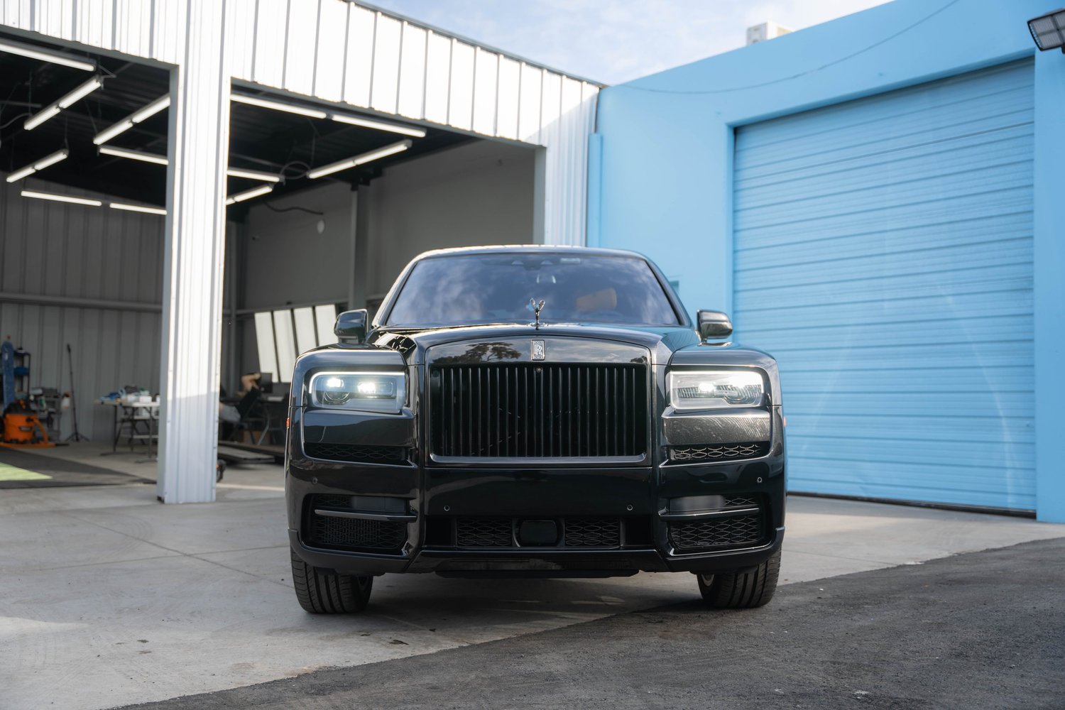 Black Rolls-Royce Cullinan Black Badge with Yellow Brake Calipers after Paint Protection Film (PPF), Window Tint and Ceramic Coating, direct front view